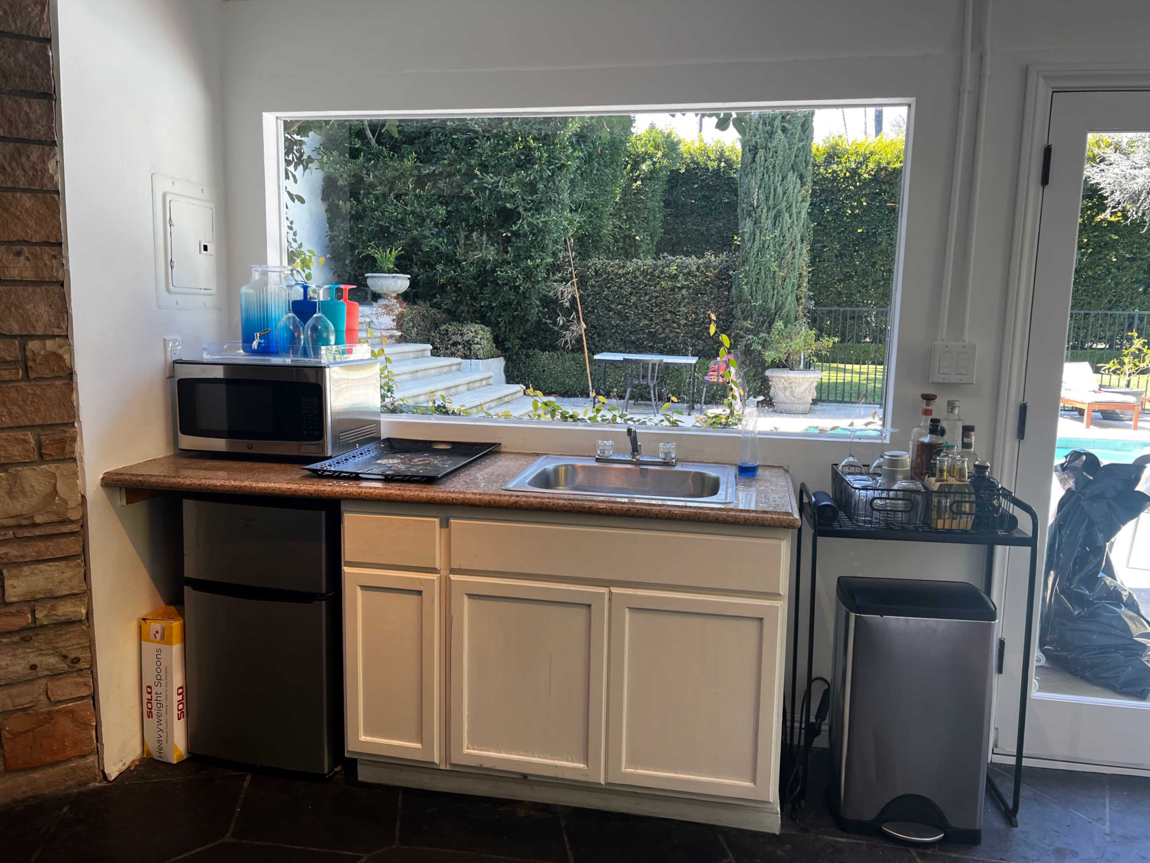 Massive Mid City 1/3 acre yard with 40’ pool, built-in spa and mid century guesthouse Image in Arlington Heights, Los Angeles, CA