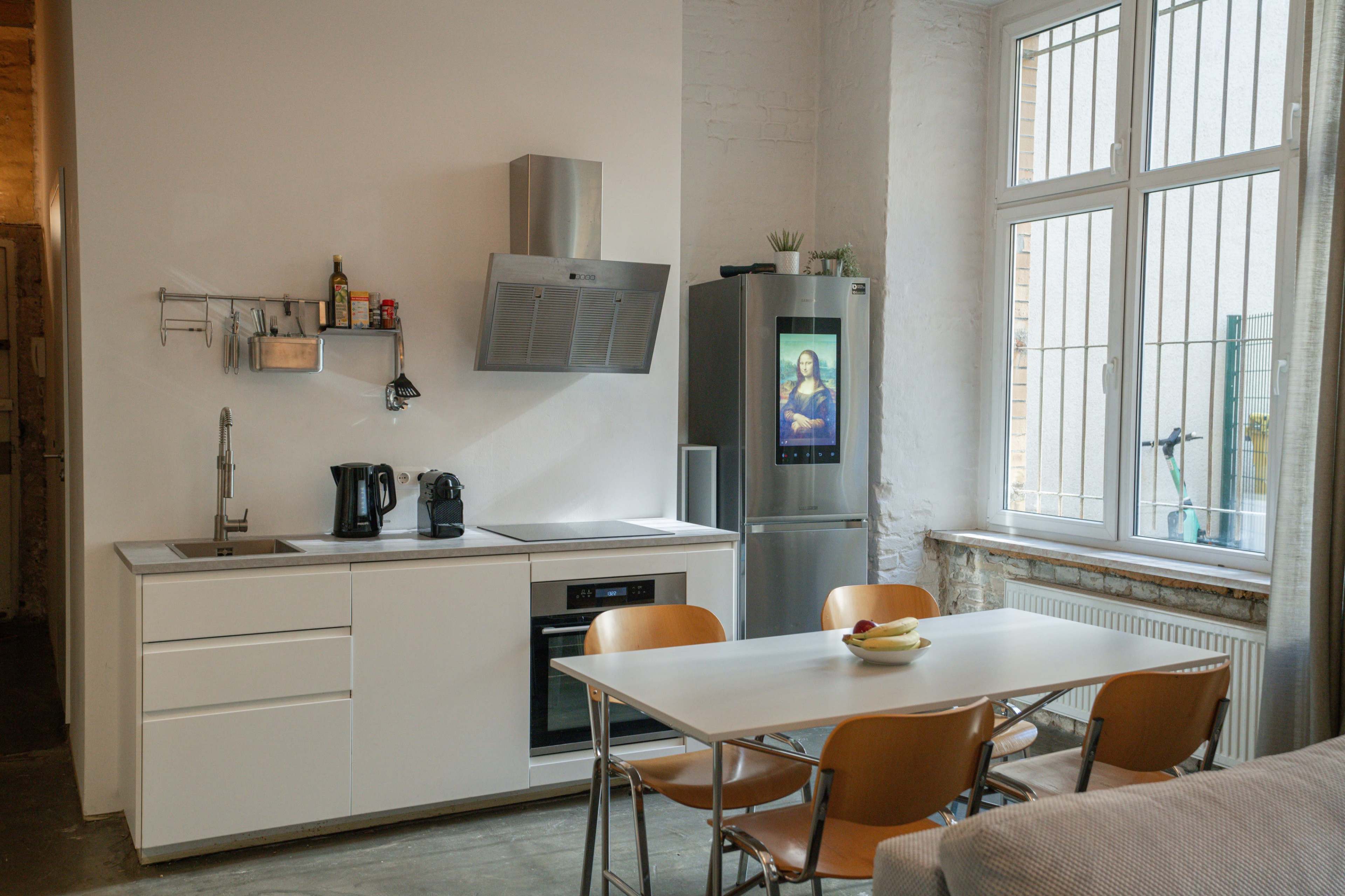 Spacious Industrial Loft with Natural Light, Fireplace, Music Studio & Projector – Perfect for Creative Productions." Image in Prenzlauer Berg, Berlin, 