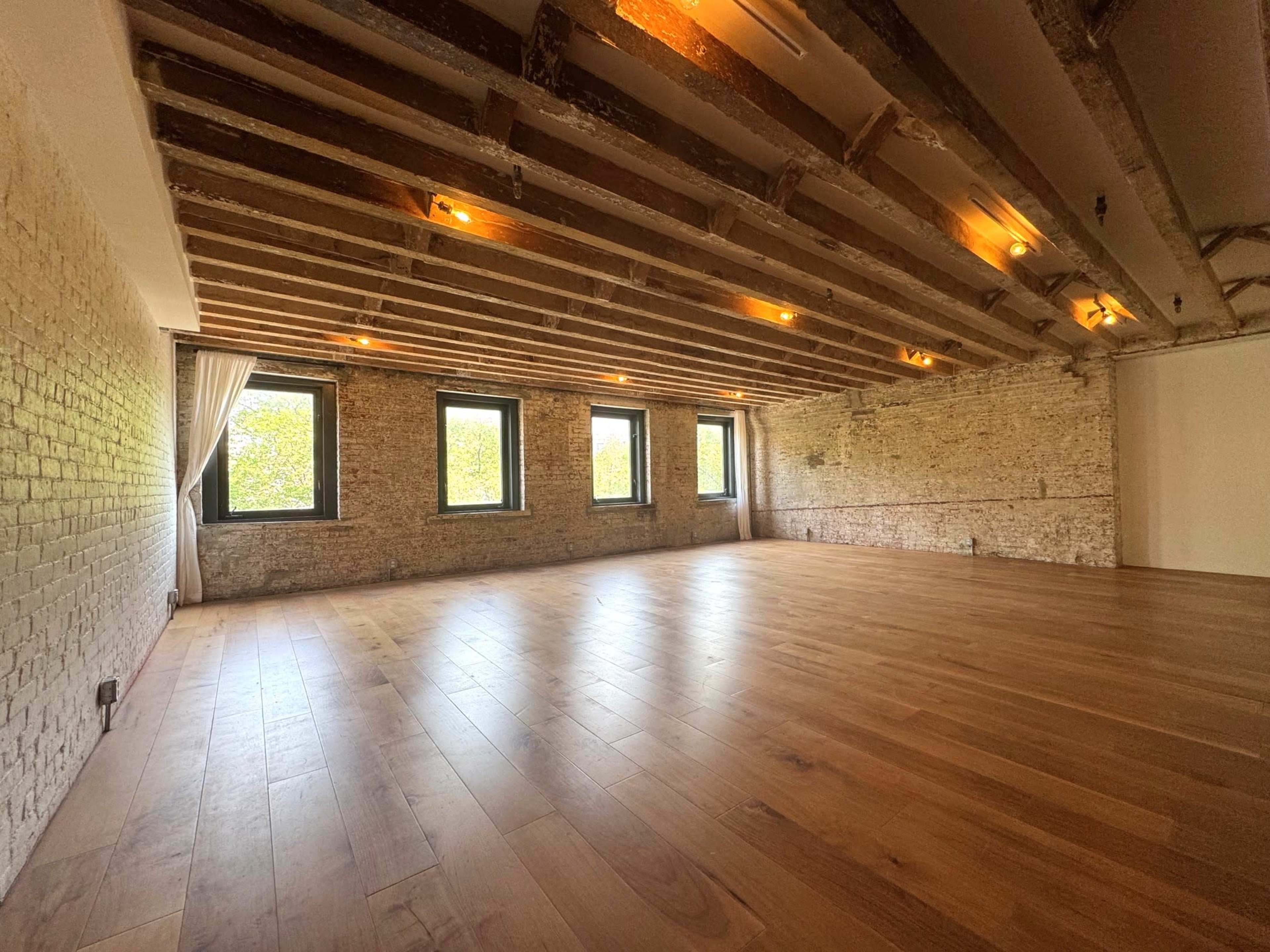 Conveniently-located Studio with Exposed Brick & Park Views in LES Image in Chinatown, New York, NY