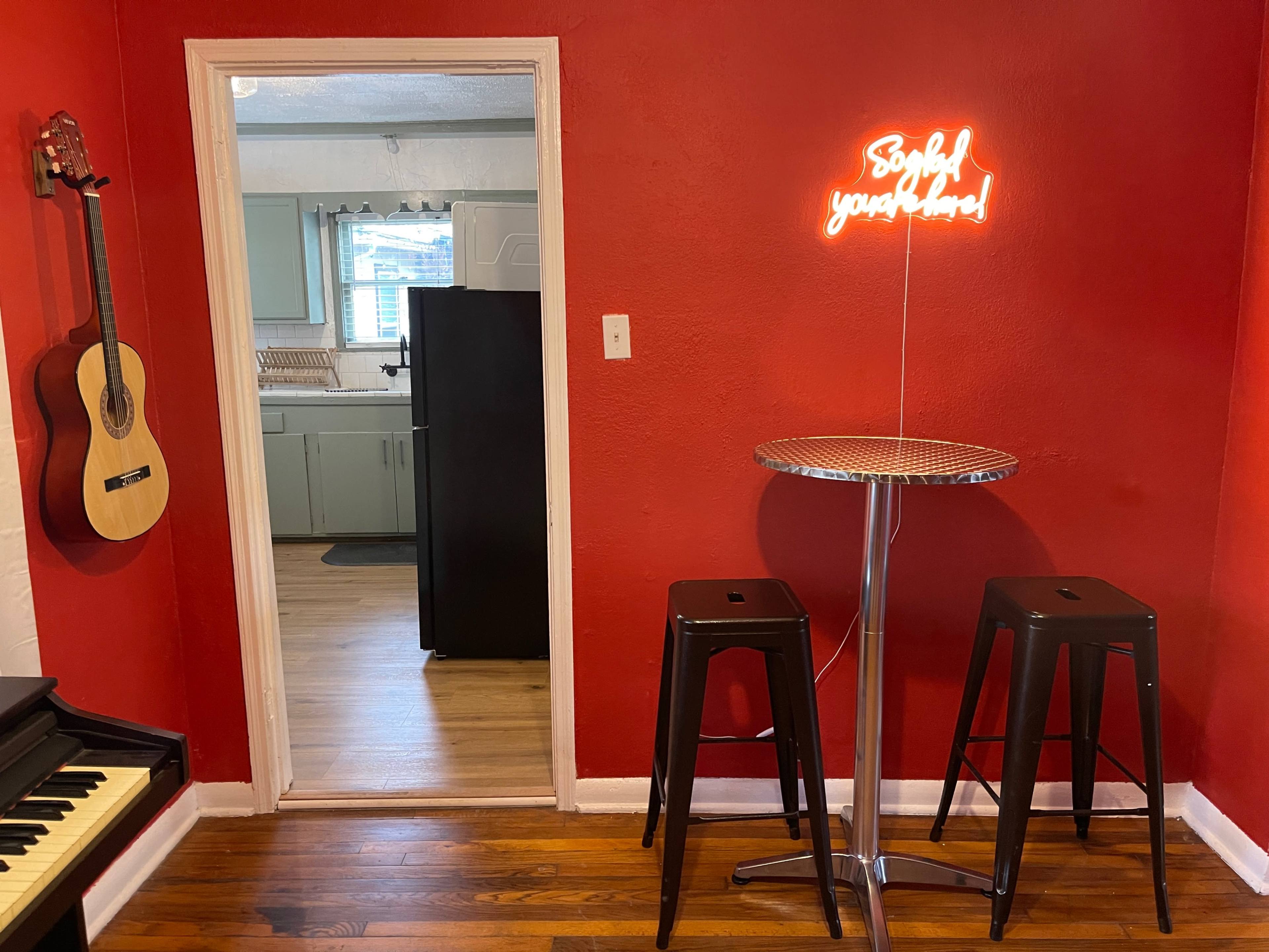 Bold Red Pop-Art Creative Space w/ Arcade Games, Piano & Neon Image in Olmos Park Terrace, San Antonio, TX