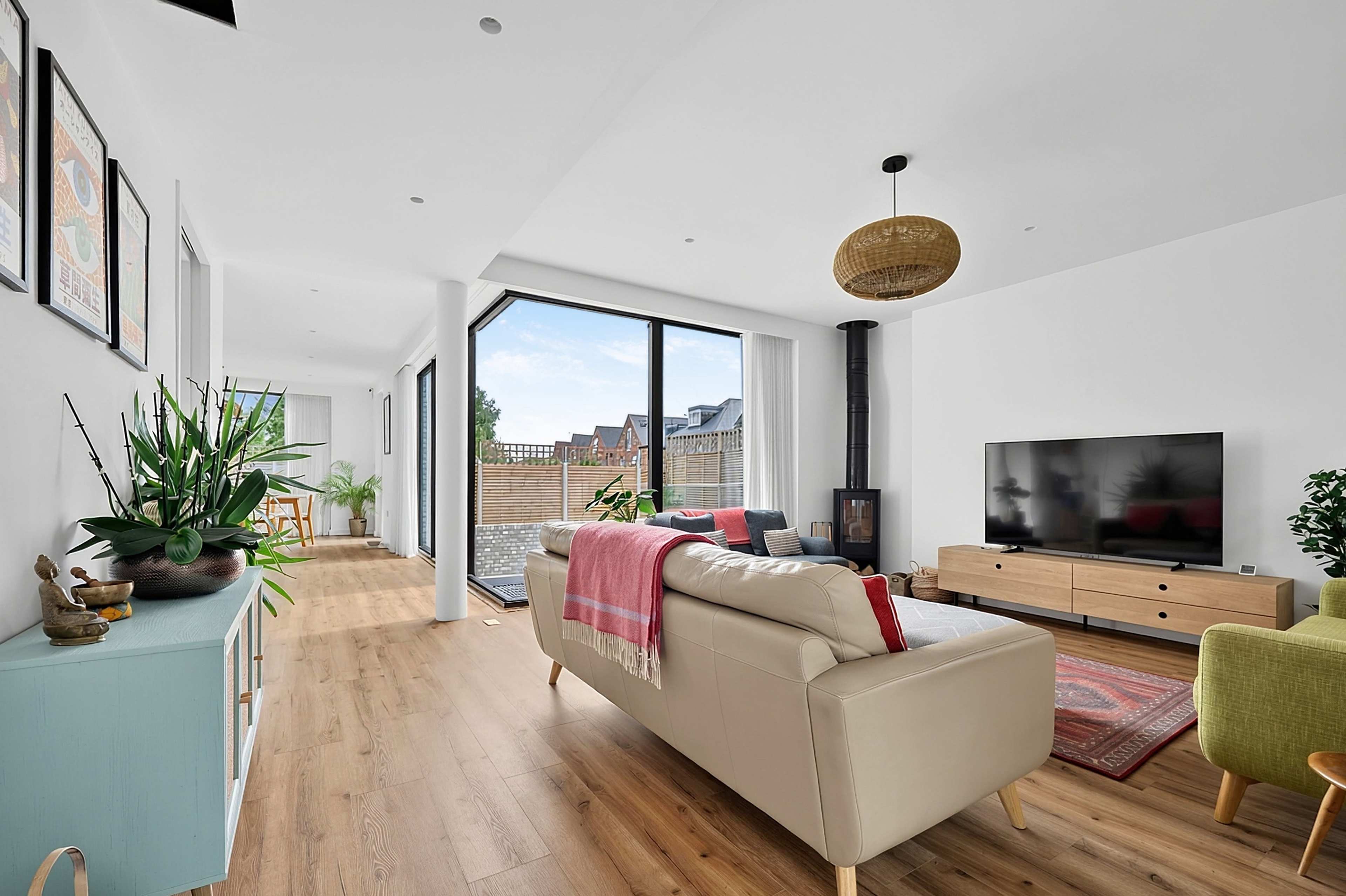 Architect Designed Modern Home with Panoramic Glass, Sunken Courtyard, Feature Brick Wall and Log Burner Image in London, London, ENG