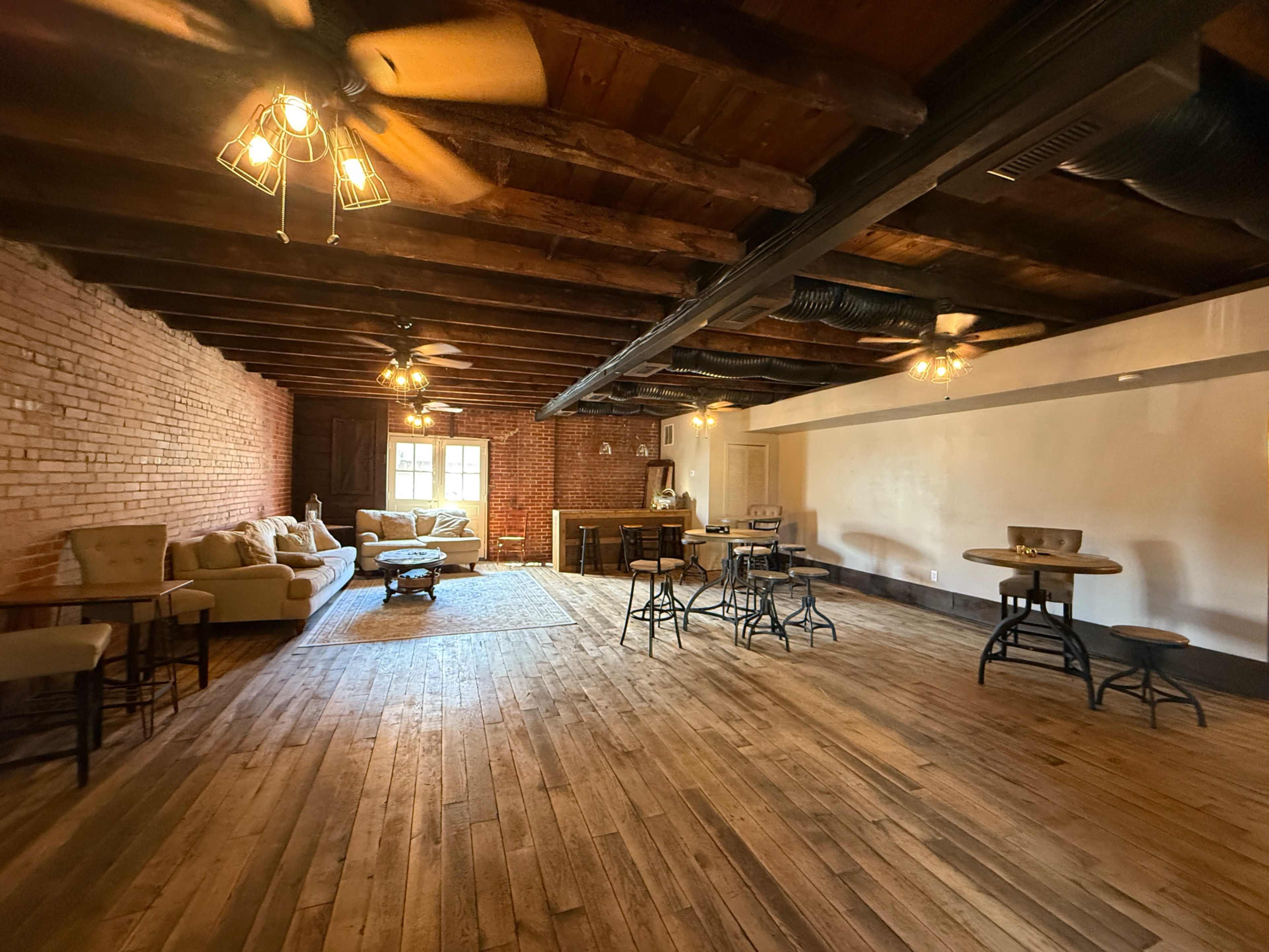 Charming two-level brick venue built in the early 1900s, blending timeless character with modern comfort Image in Old Town, Winchester, VA