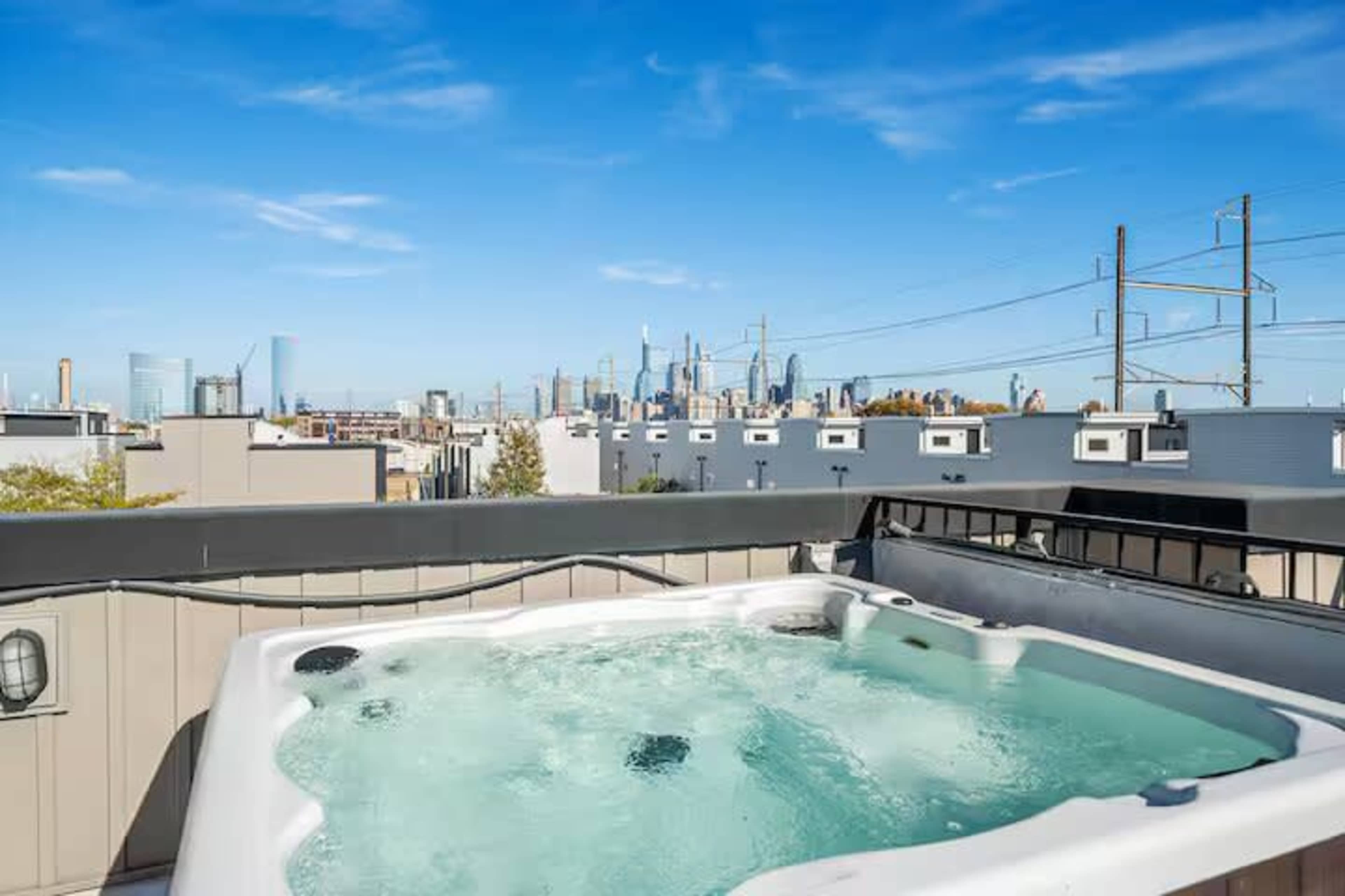 SkyHigh Luxury: Rooftop Jacuzzi Escape Image in Grays Ferry, Philadelphia, PA