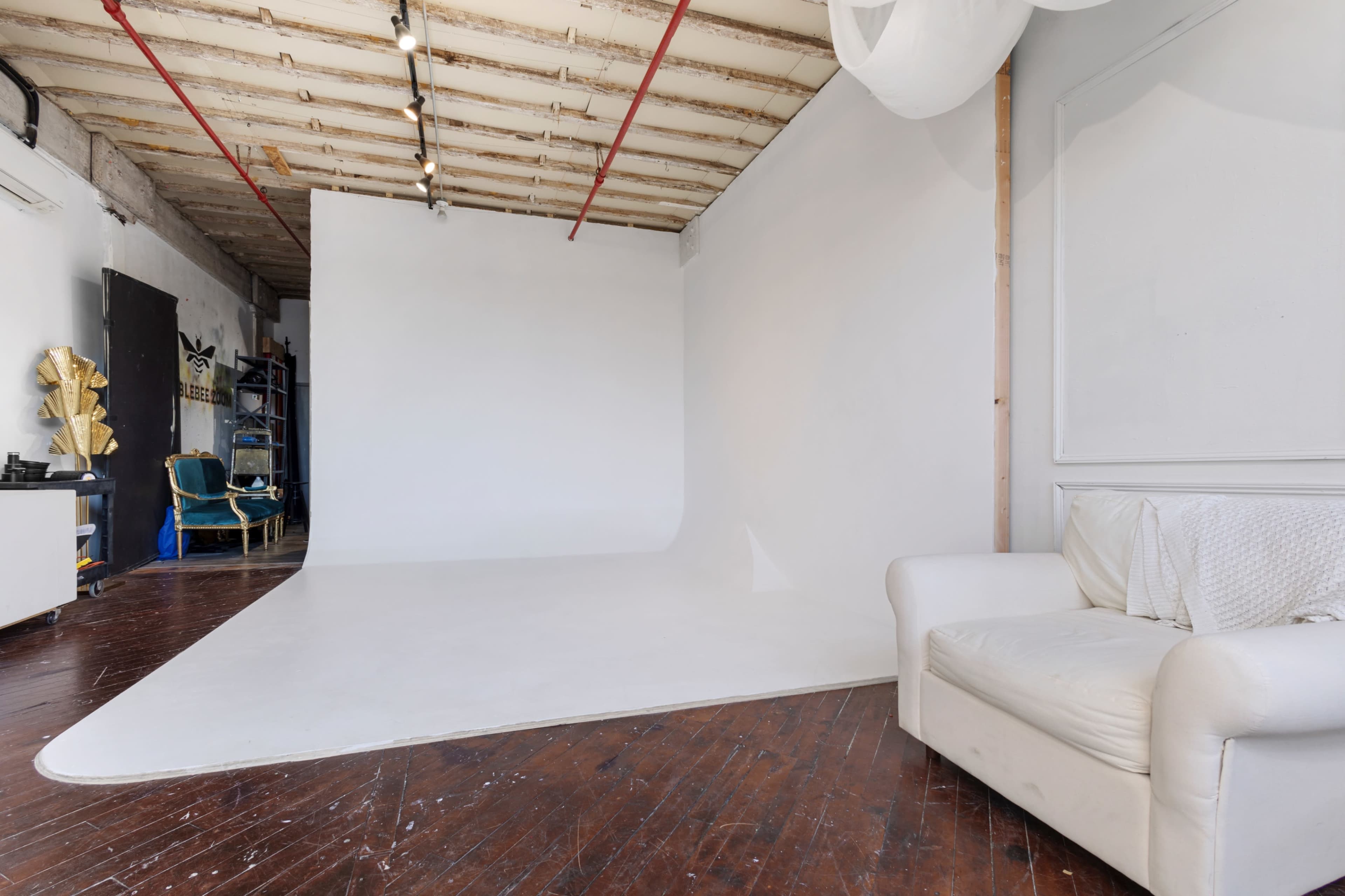 Photo and video studio rental. 750 sq ft space with 12' ceilings located on the edge of a vibrant area of Brooklyn, Industry City. Multiple stages & cyc wall. Equipment & props are included. Image in Sunset Park, Brooklyn, NY