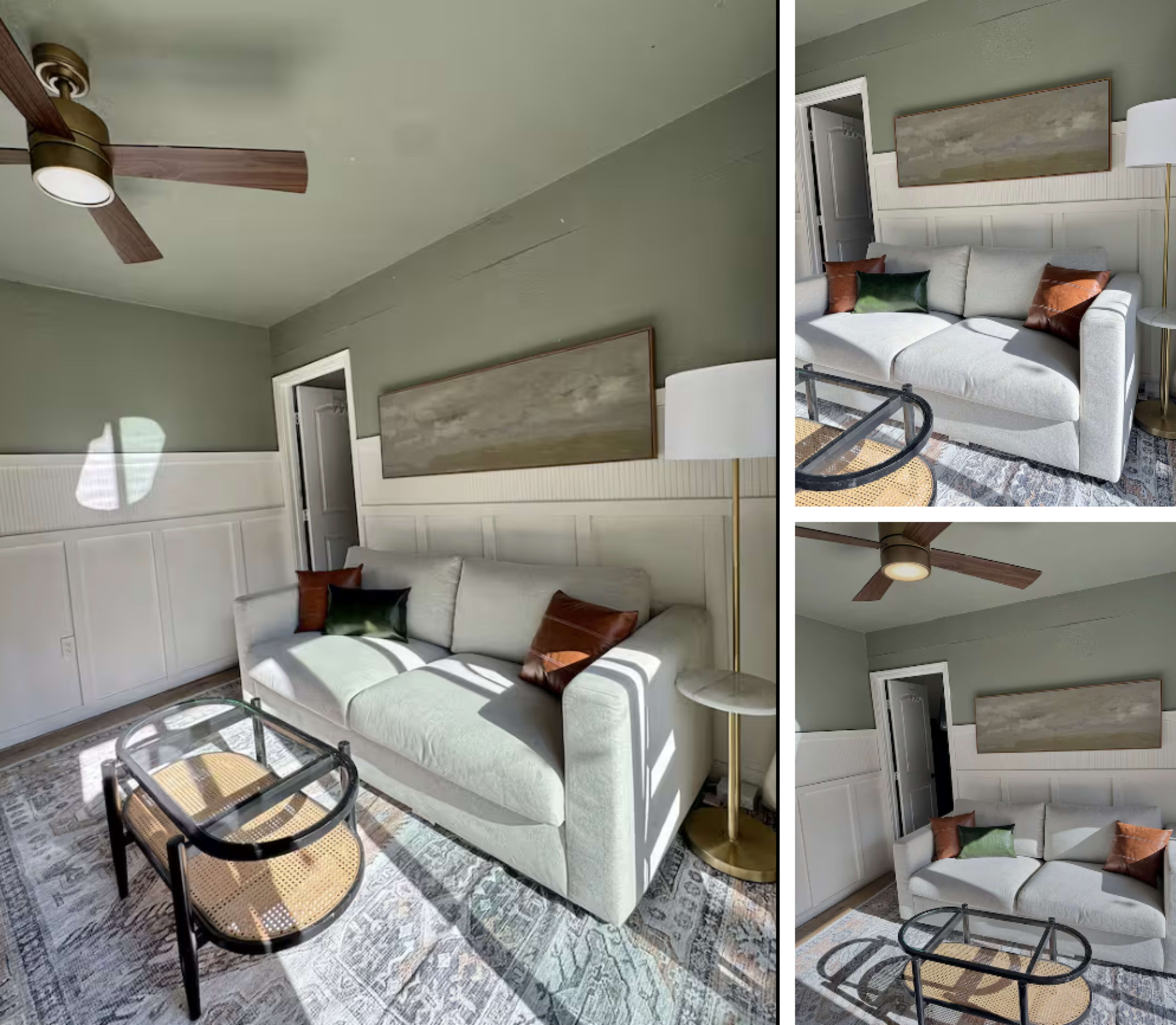 The image shows a living room with a light-colored sofa, a coffee table, and a ceiling fan, against a backdrop of green walls and a white wainscoting.