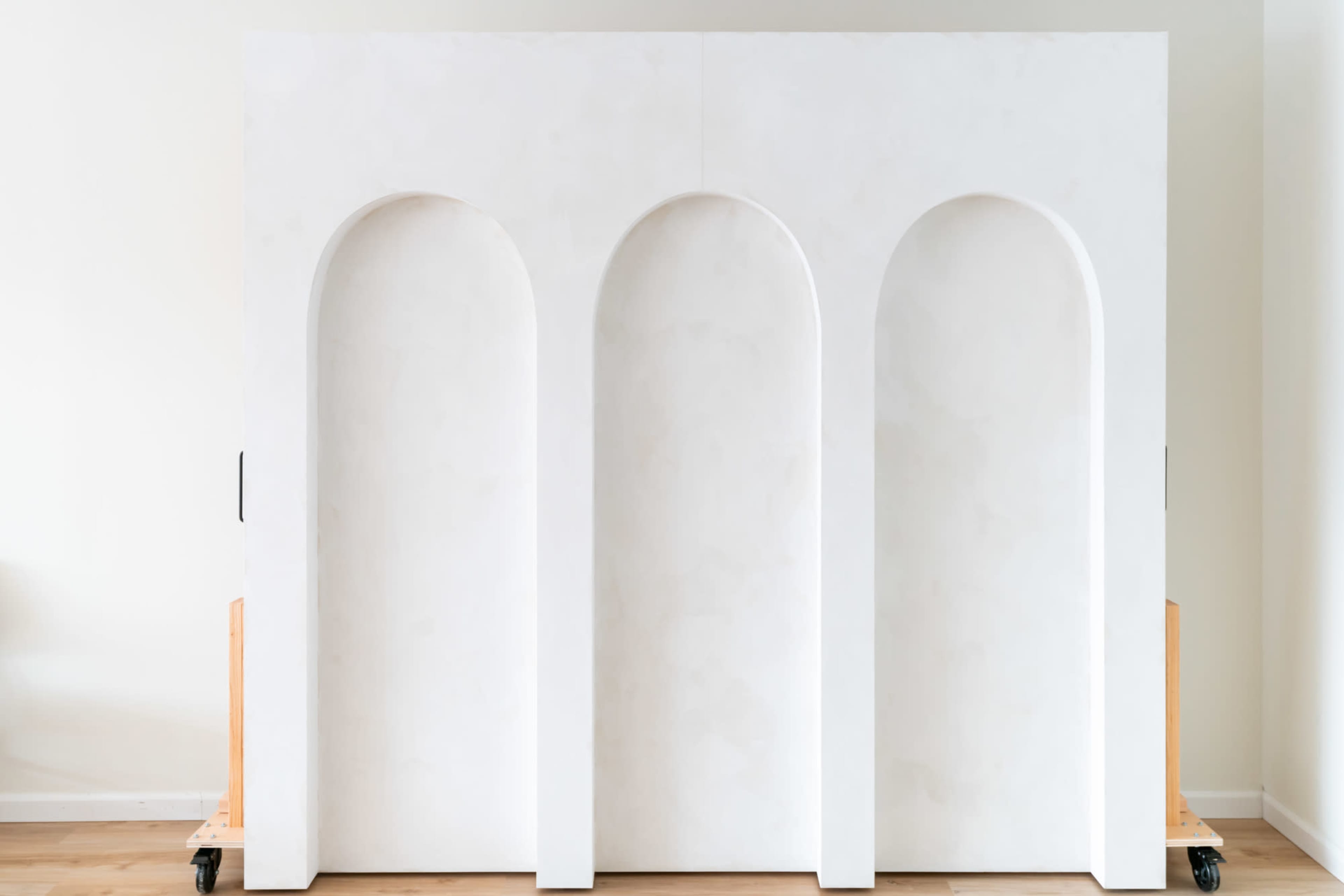 Neutral Aesthetic Photo Studio with Signature Arch Wall Image in Middlefield, Meriden, CT