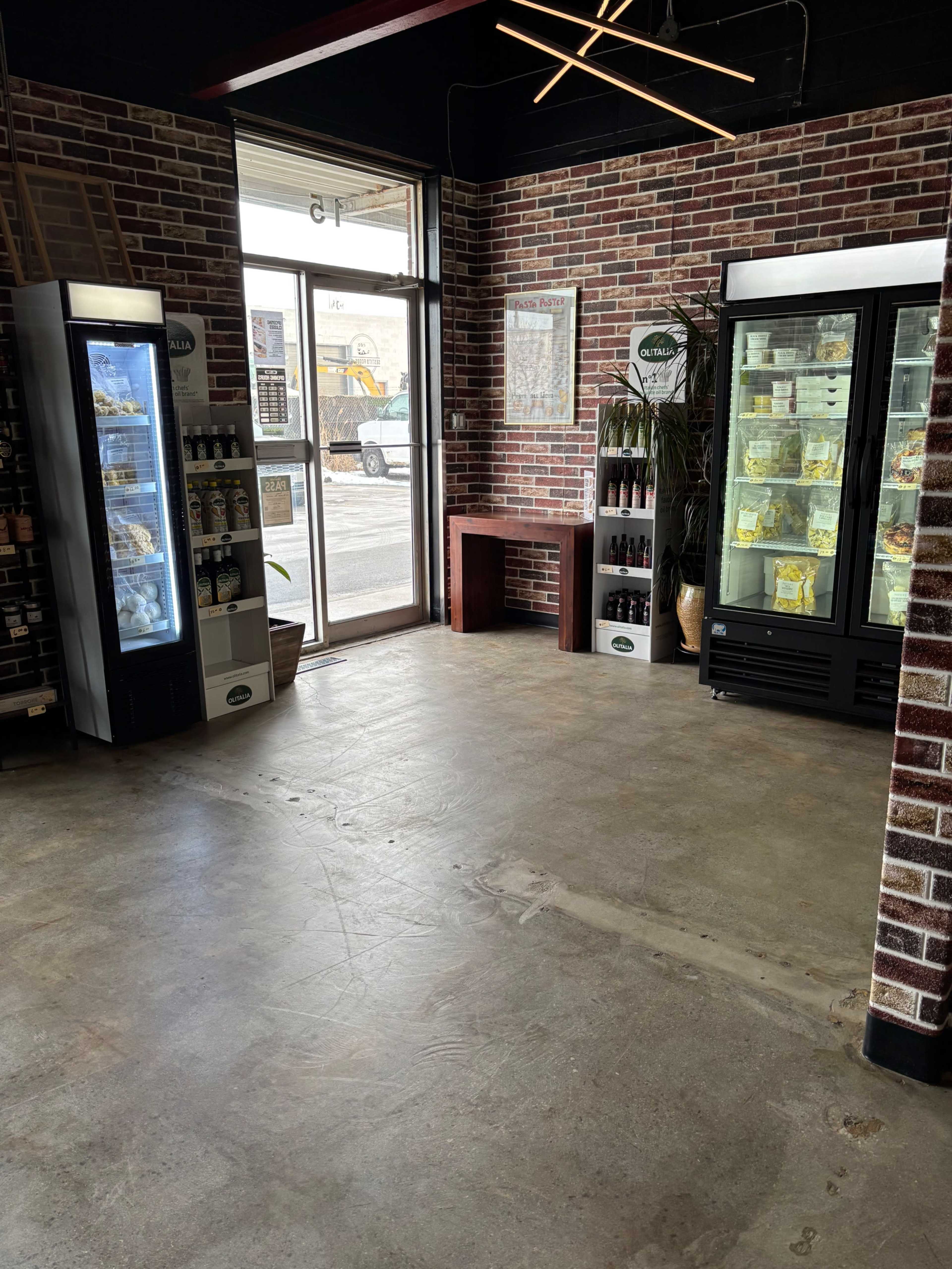 Modern industrial inspired retail space with commercial kitchen Image in Humber Summit, Toronto, ON