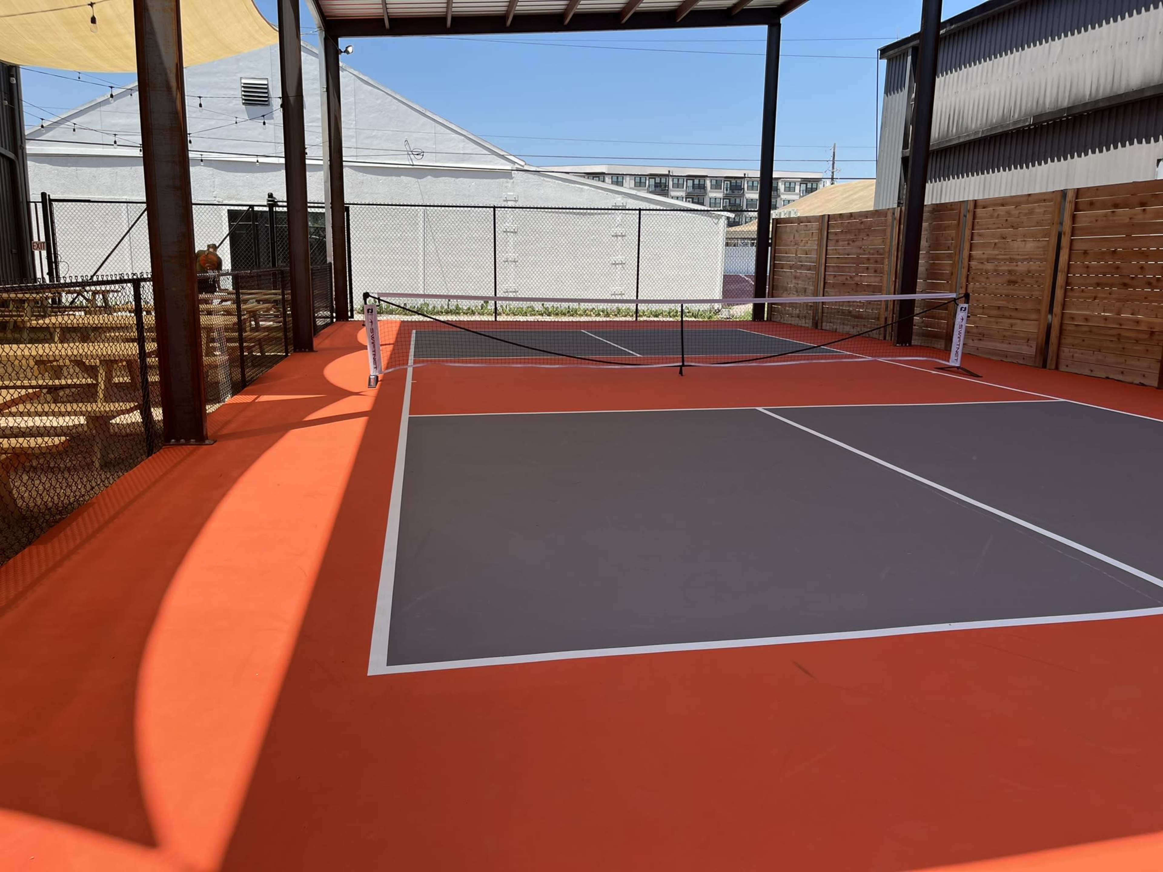 Pickleball Bar with 250 Drink Options and Two Food Trailers Image in East Congress, Austin, TX