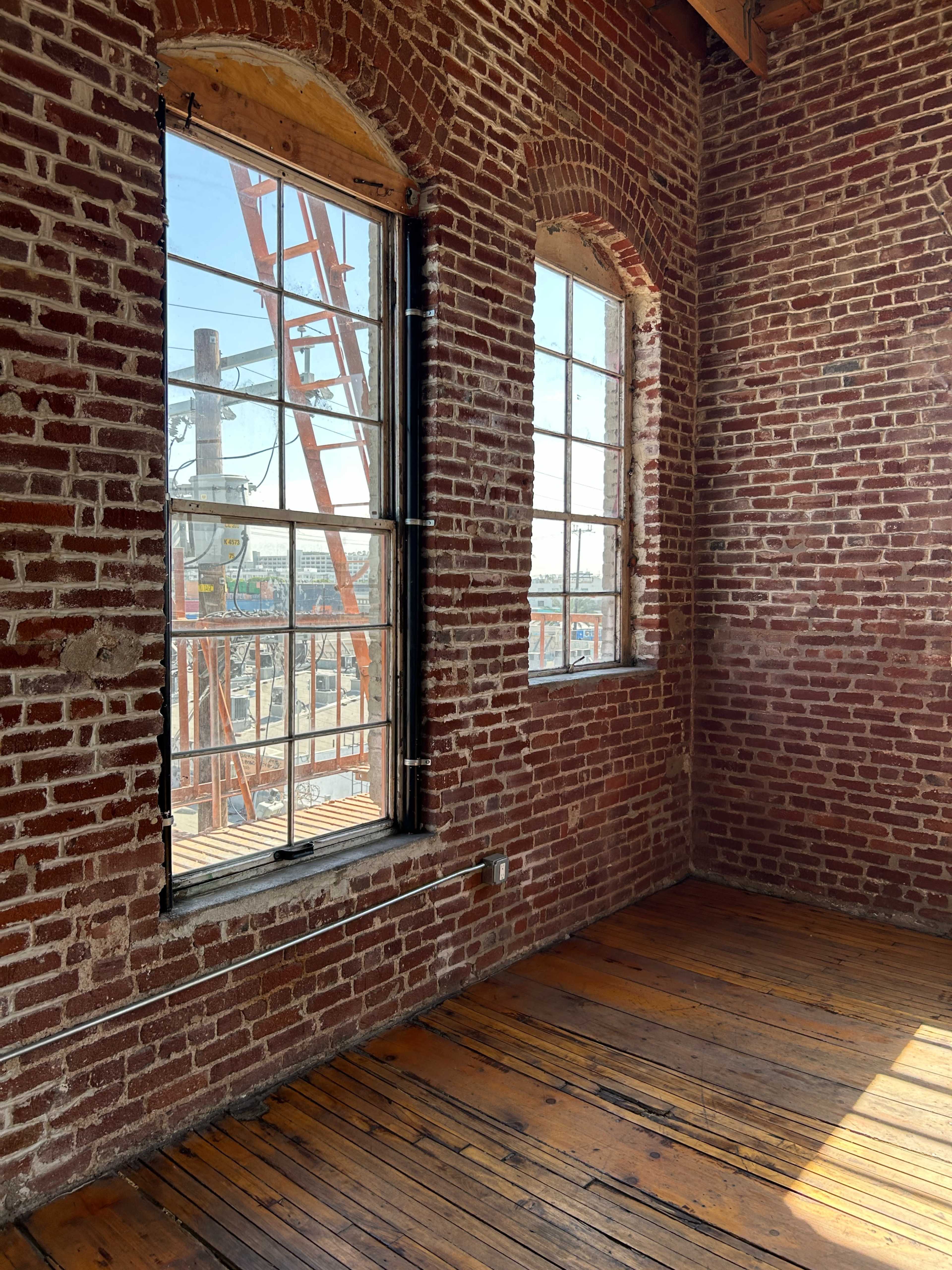 Sunlit Brick Loft Studio with Vintage Details & Wood Floors Image in Central LA, Los Angeles, CA