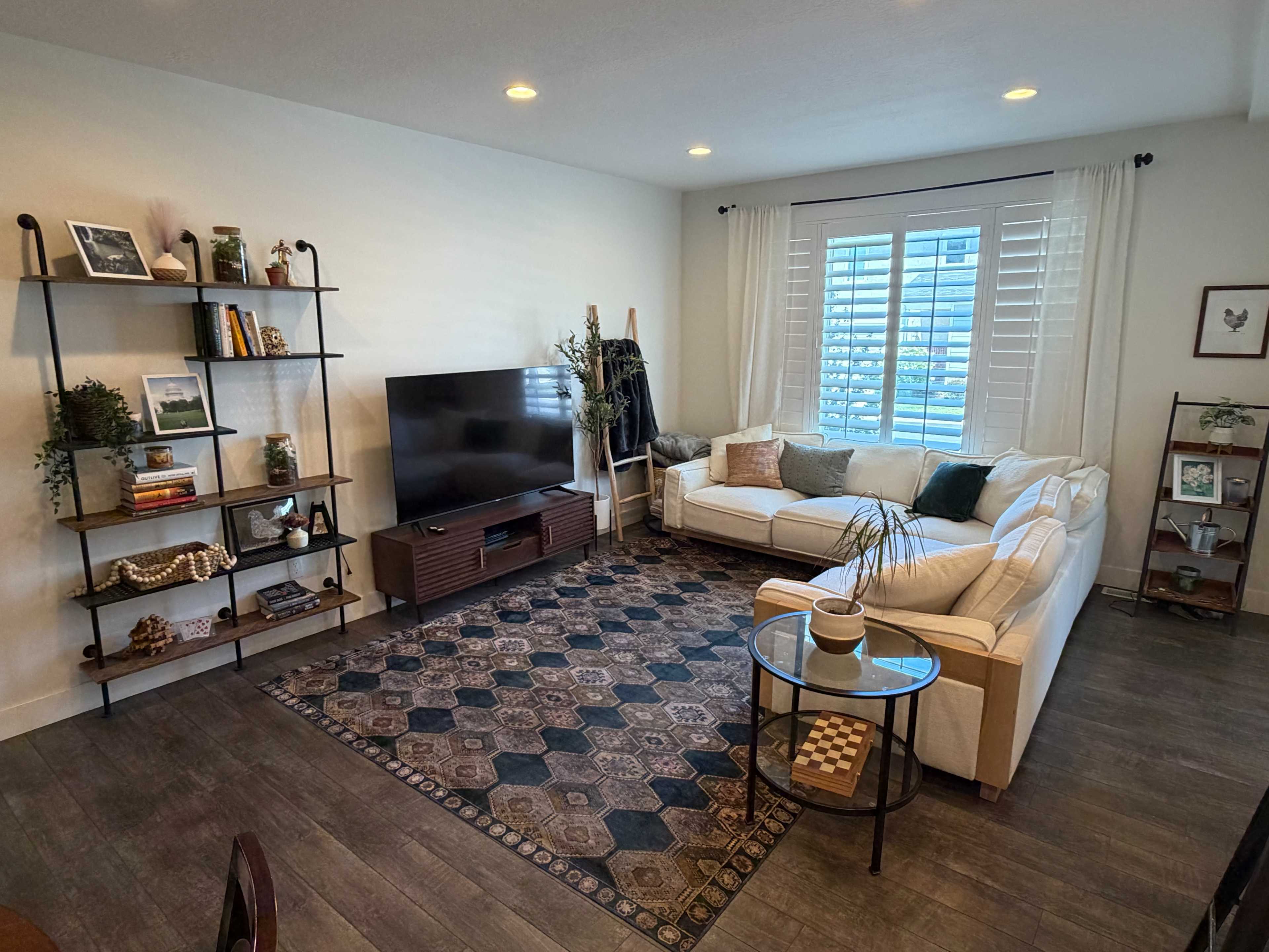 Modern Versatile Townhome with Brick Wall, Living Areas, and Content Creation Space Image in Sandy, Sandy, UT