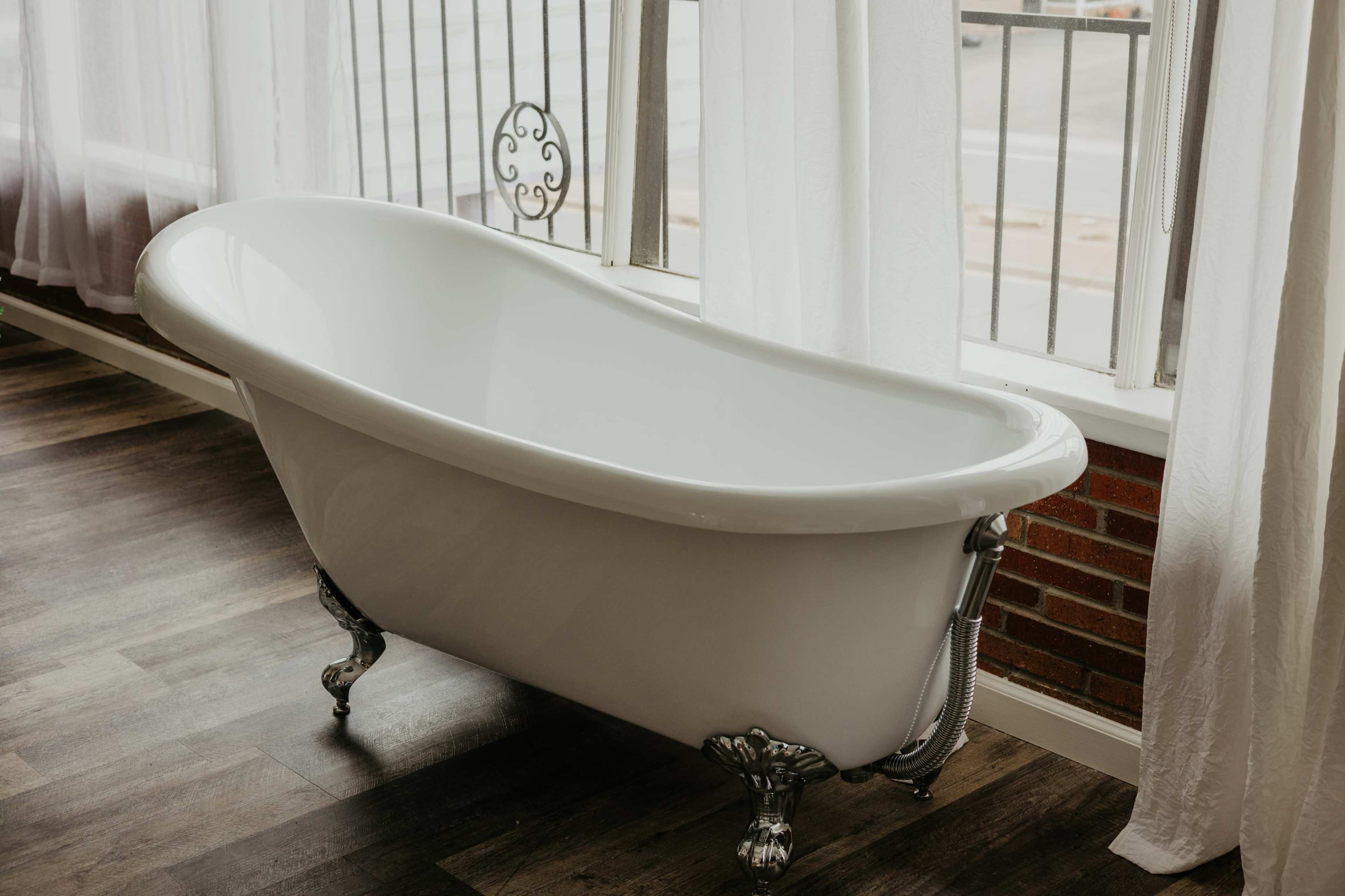 Dreamy Natural Light Studio with Brick Wall, Large Windows & Clawfoot Tub Image in Morse Park, Lakewood, CO