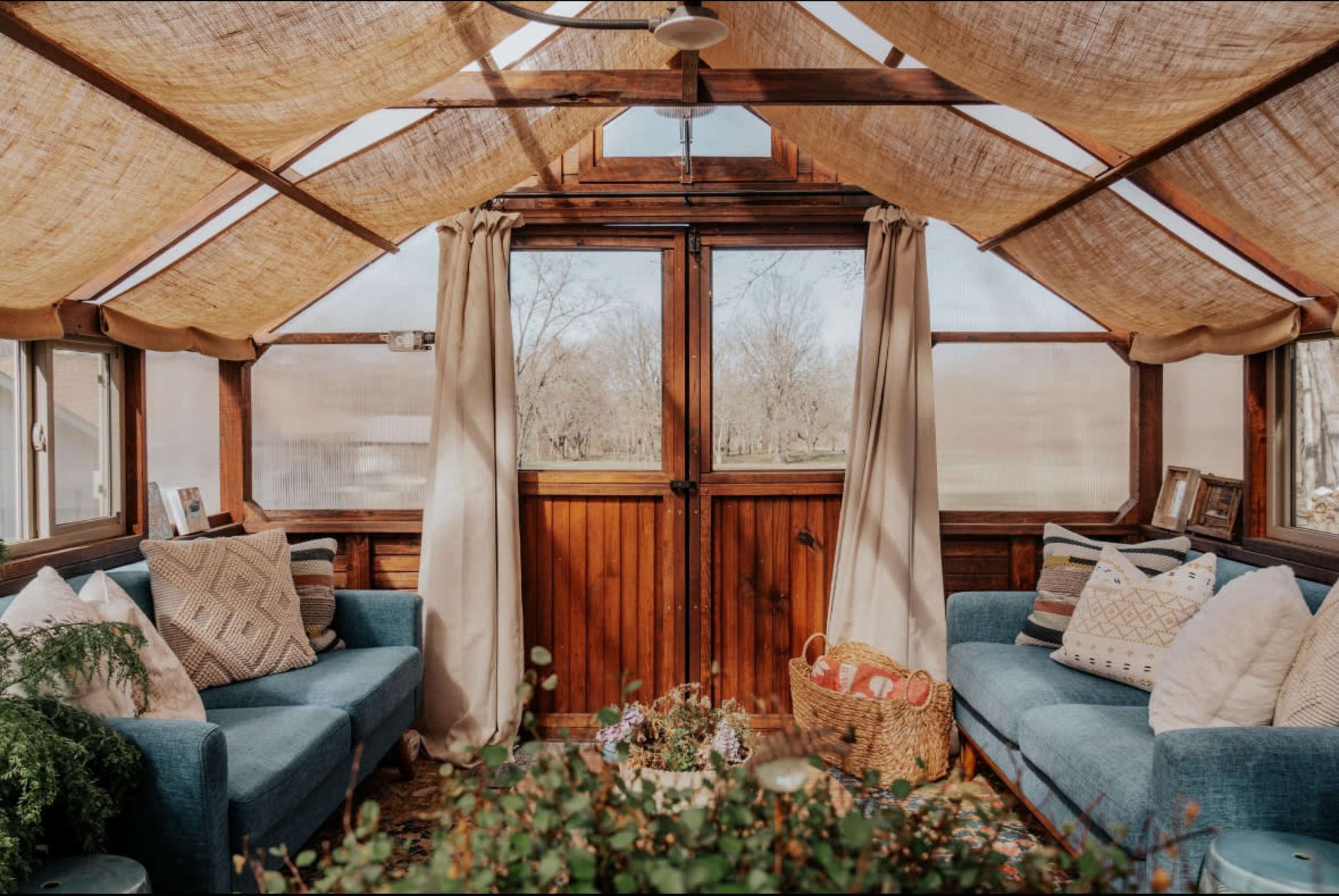 Picturesque Yoderbilt Greenhouse on 12 Wooded Acres Image in Mt Pleasant Township, Belton, MO