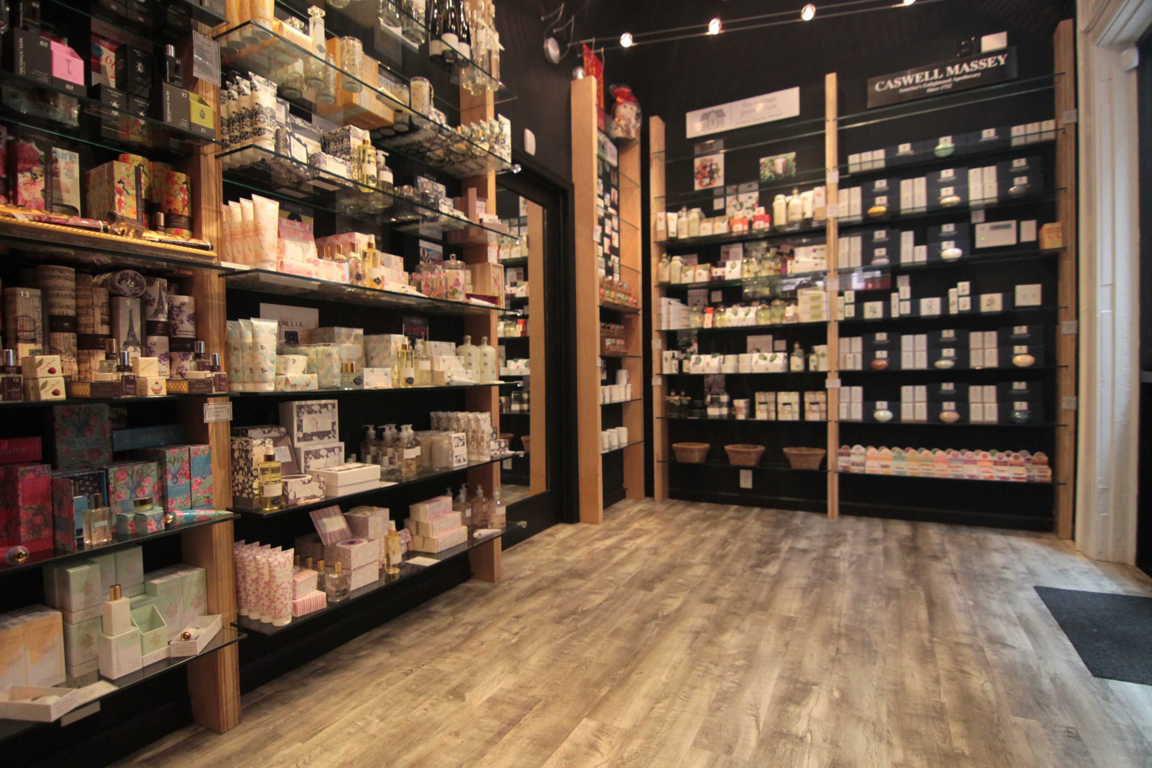 A well-organized retail space filled with shelves of various beauty and personal care products.
