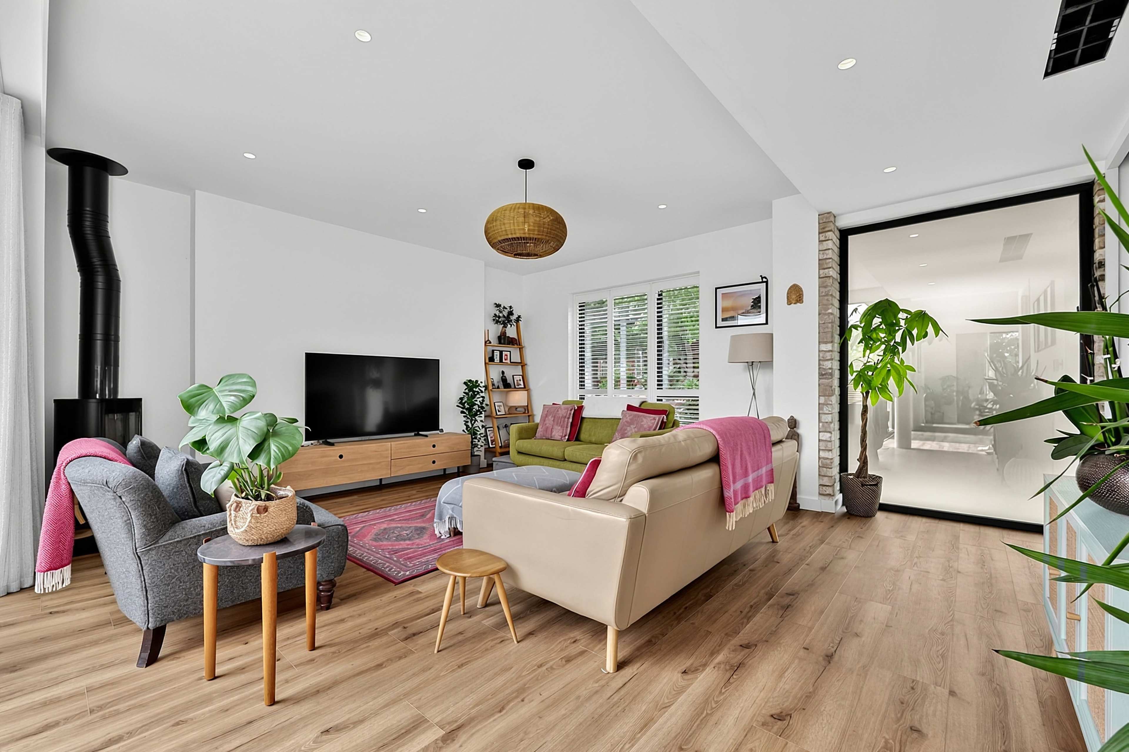 Architect Designed Modern Home with Panoramic Glass, Sunken Courtyard, Feature Brick Wall and Log Burner Image in London, London, ENG