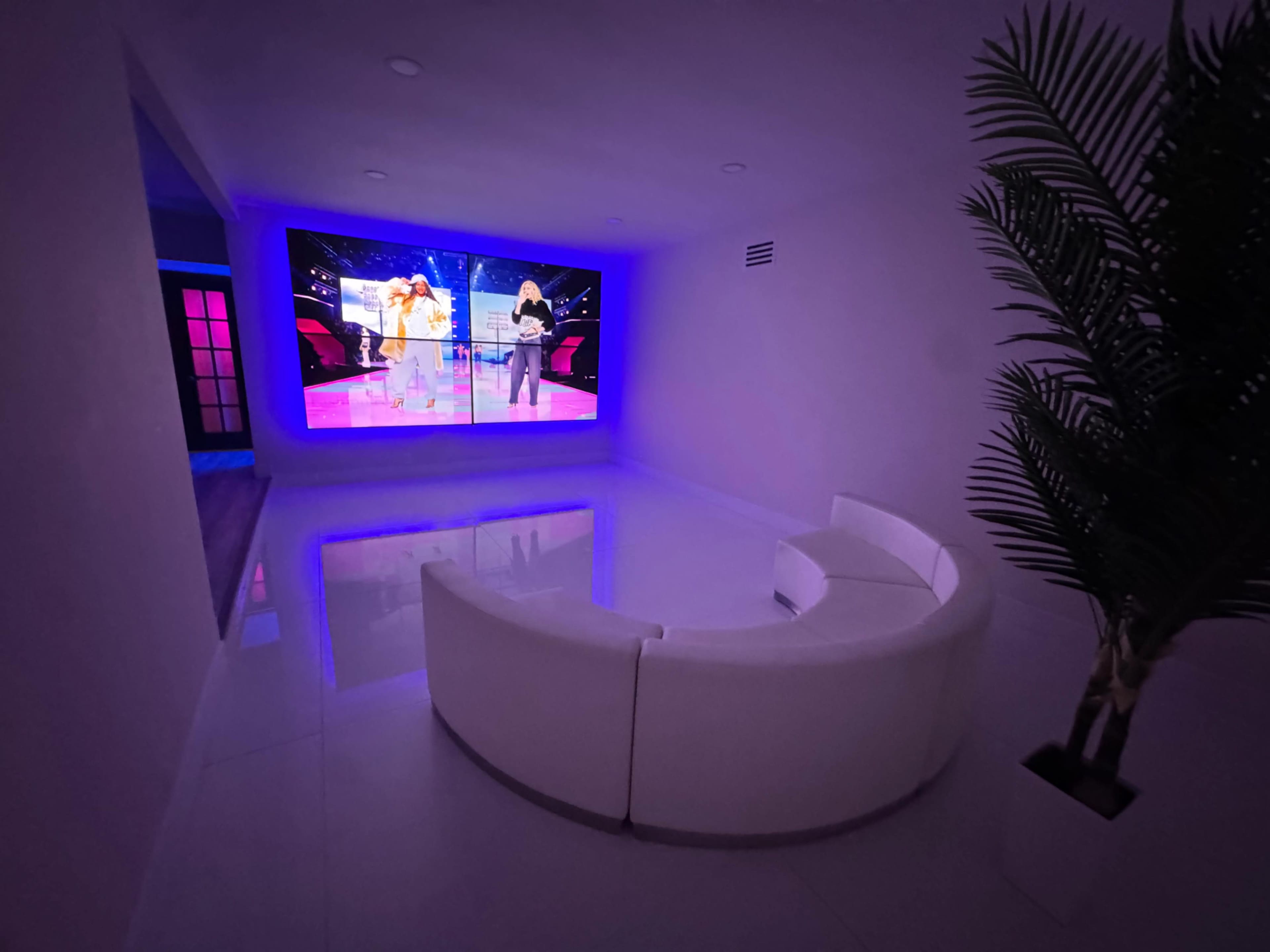 Modern White Room with TV Wall Image in The Section 10, Las Vegas, NV