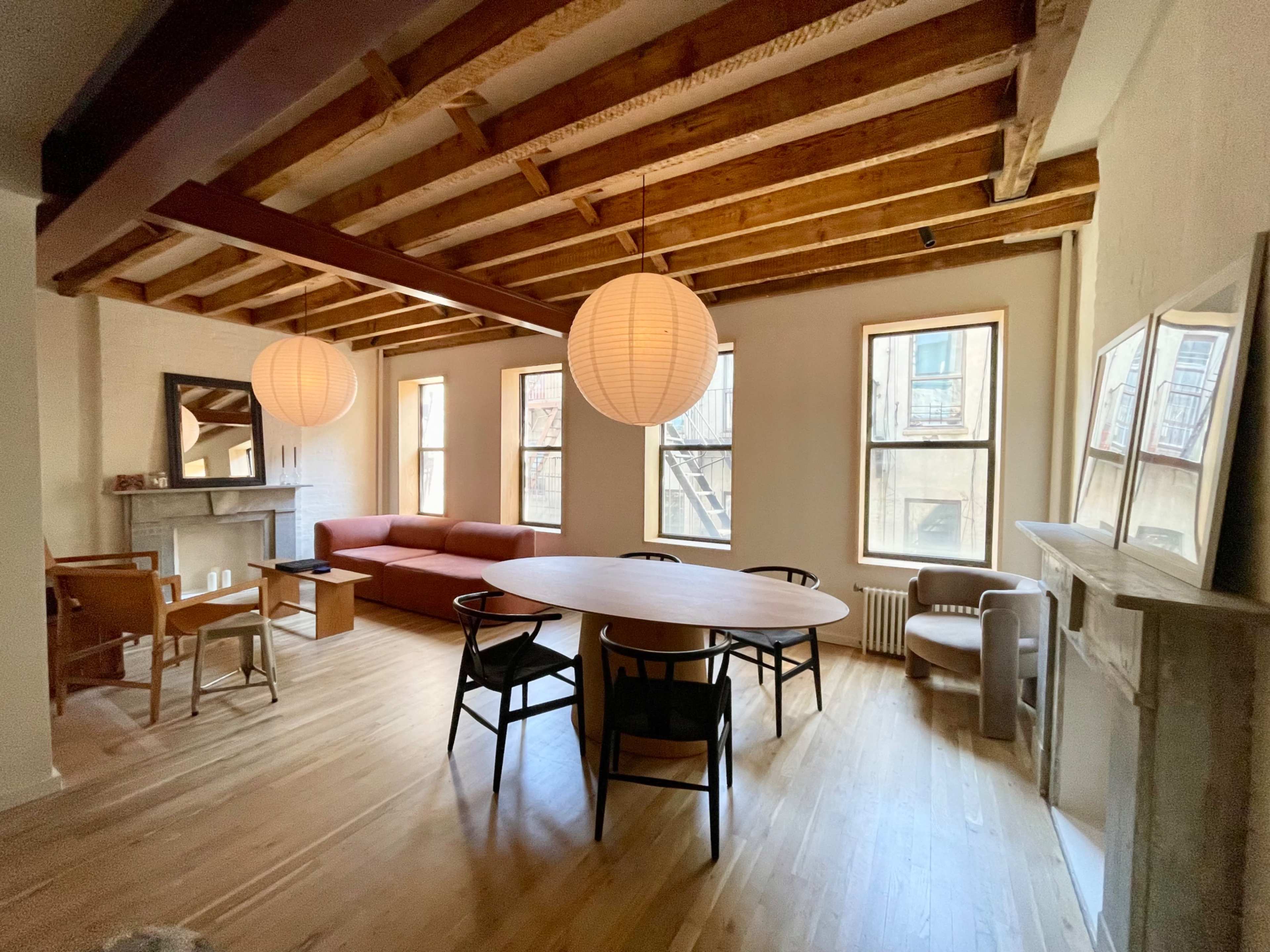 Stylish Wood Beamed Apartment With Two Decorative Fireplaces Image in East Village, New York, NY