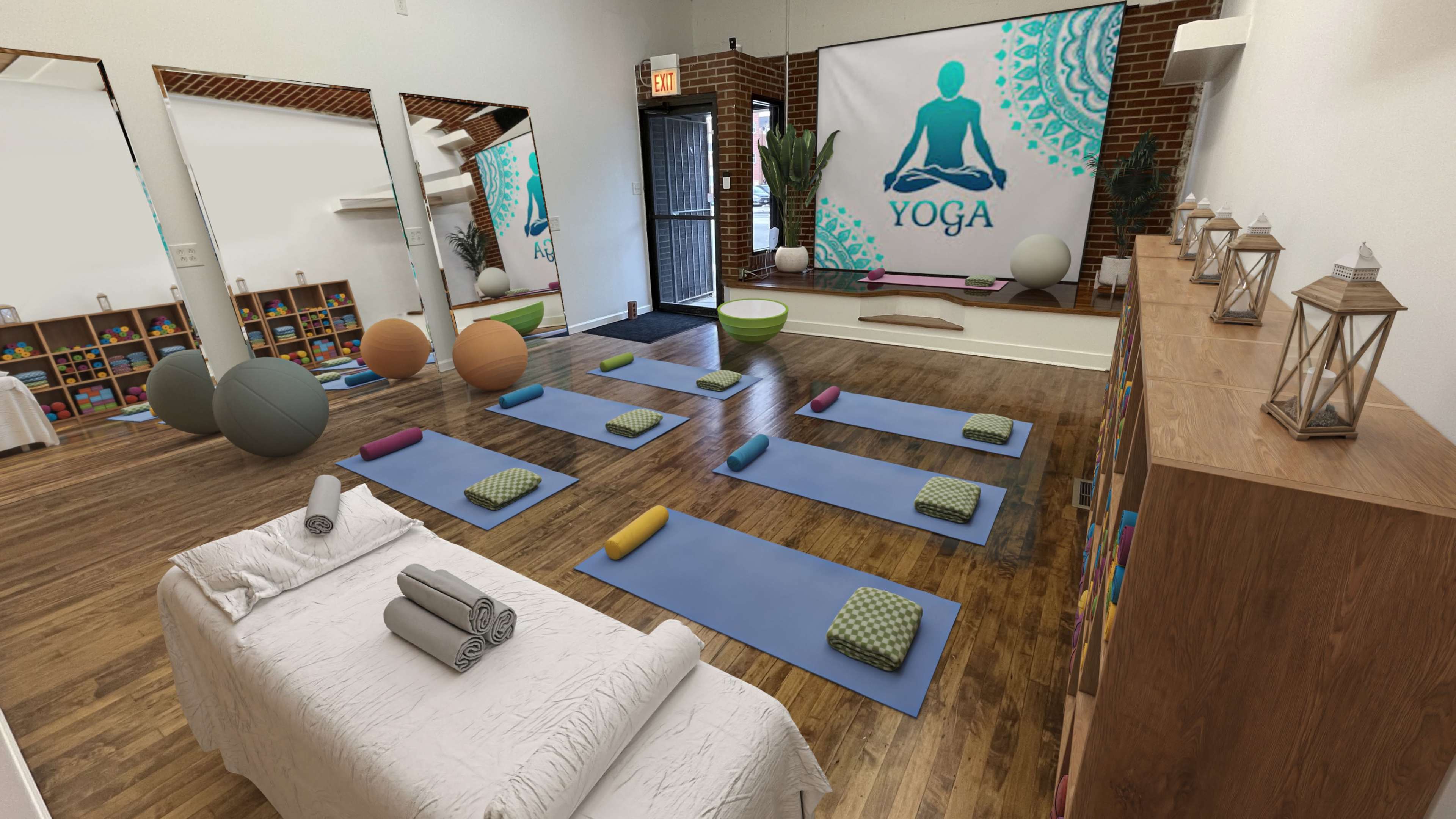A yoga studio with mats arranged for a class, a shelf of colorful yoga props, and mirrors on the walls.