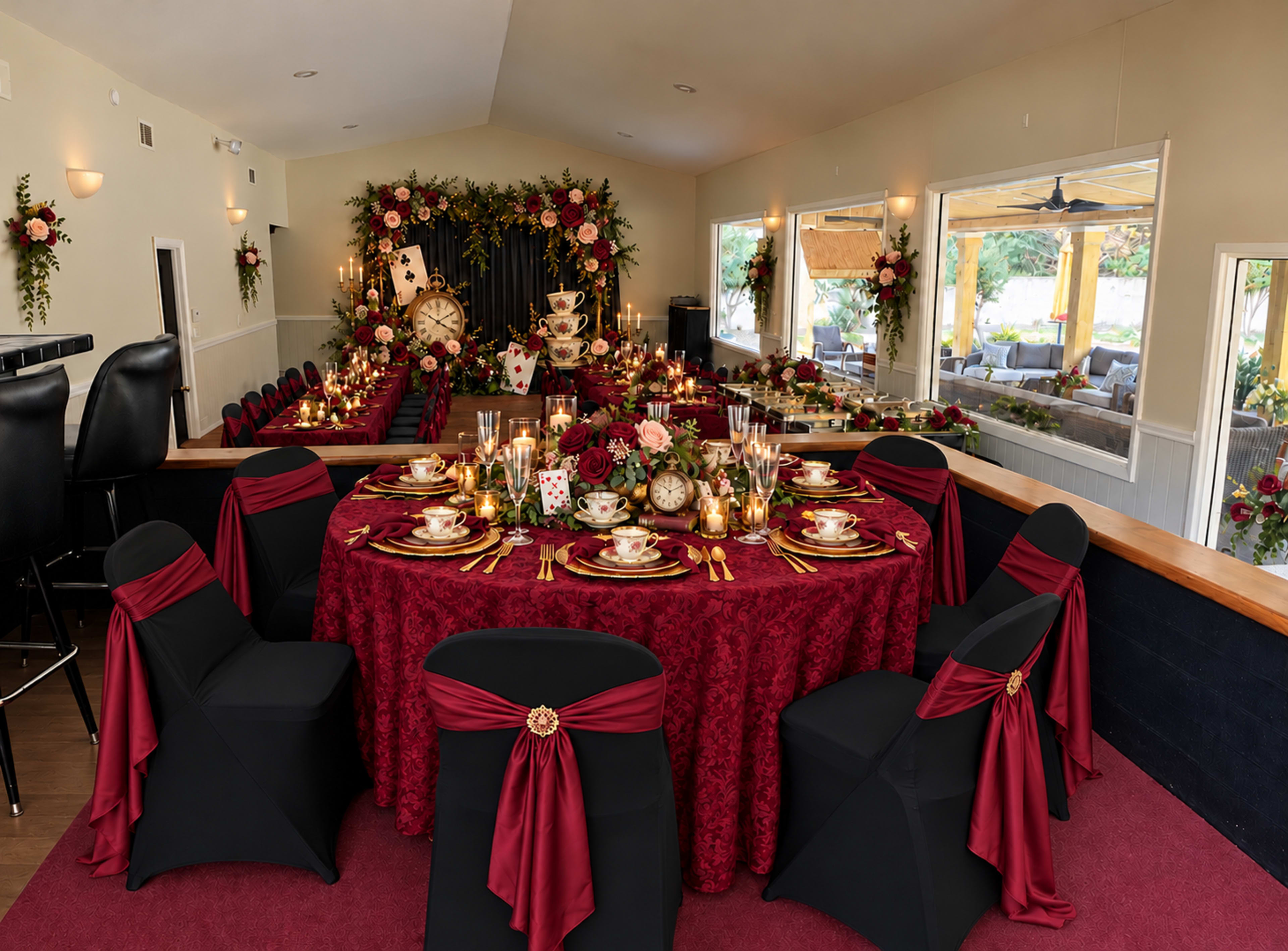 The image shows an elegantly decorated banquet hall featuring multiple dining tables adorned with red and gold tableware, floral arrangements, and candles.
