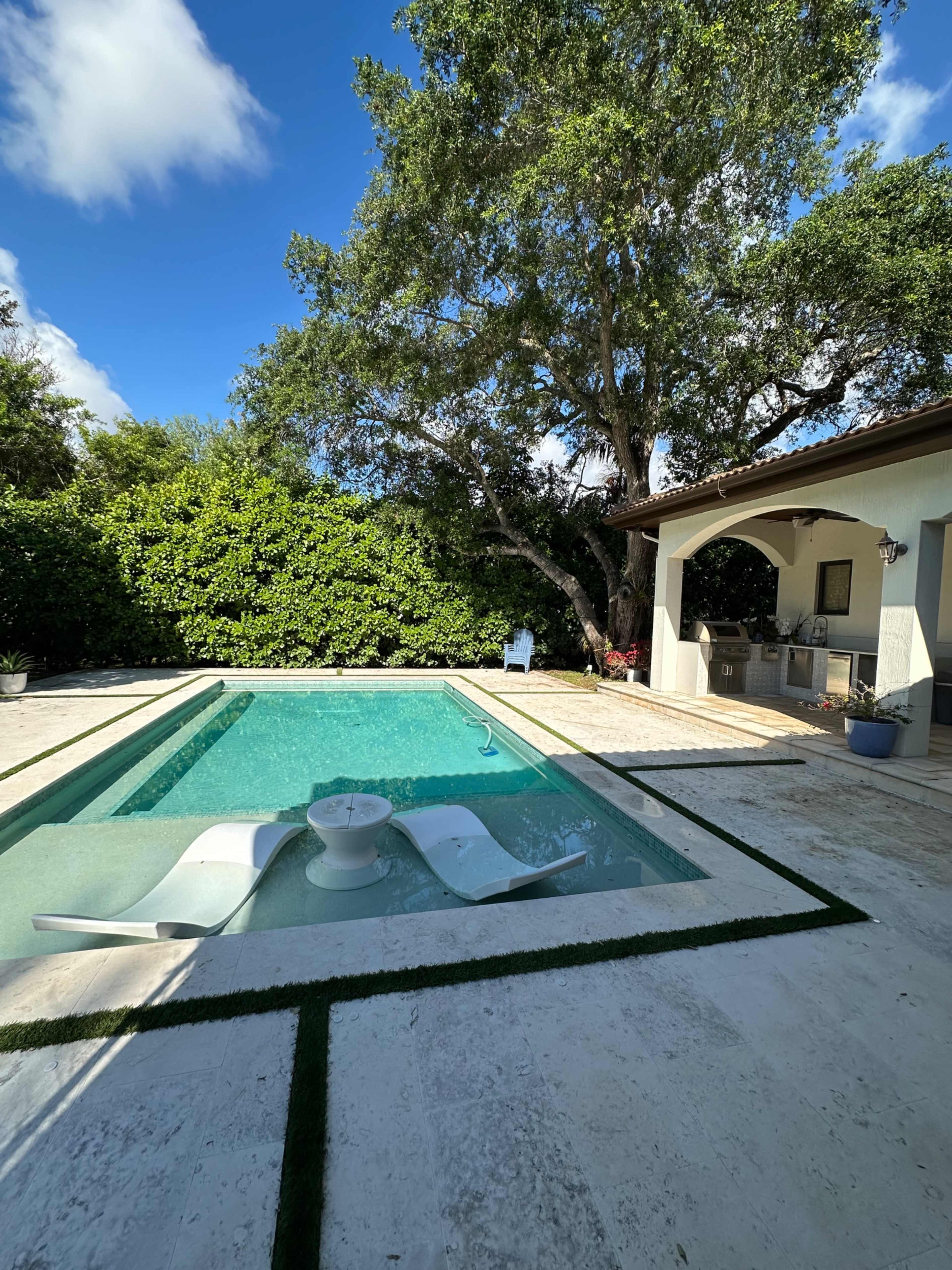 Private Garden Retreat with Pool, Oak Trees & Outdoor Kitchen Image in Glenvar Heights, Miami, FL