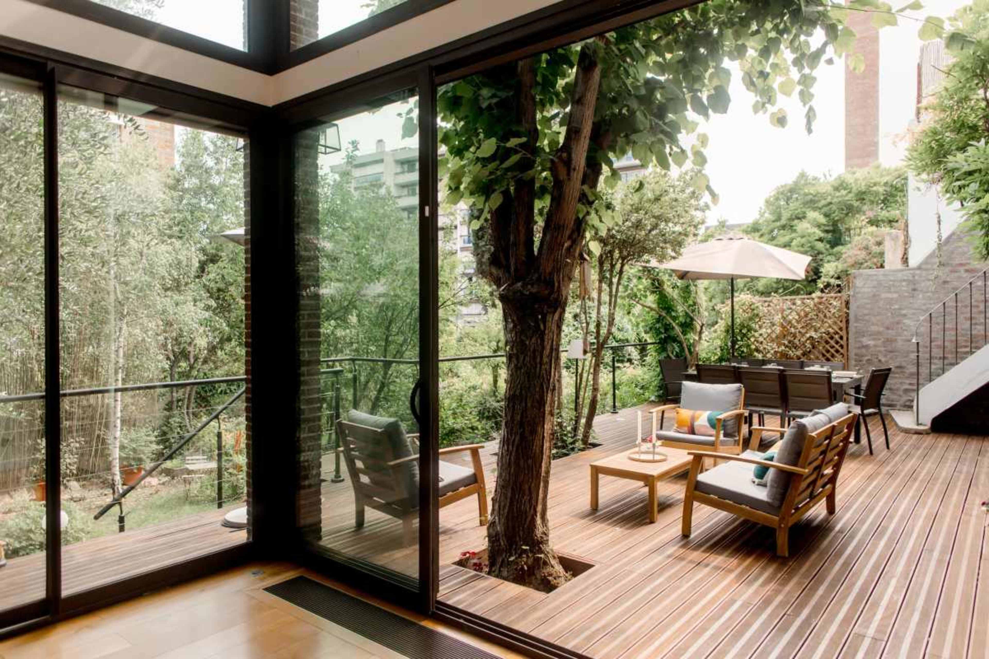 Maison familiale spacieuse climatisée avec terrasse & jardin, proche La Défense Image in , Puteaux