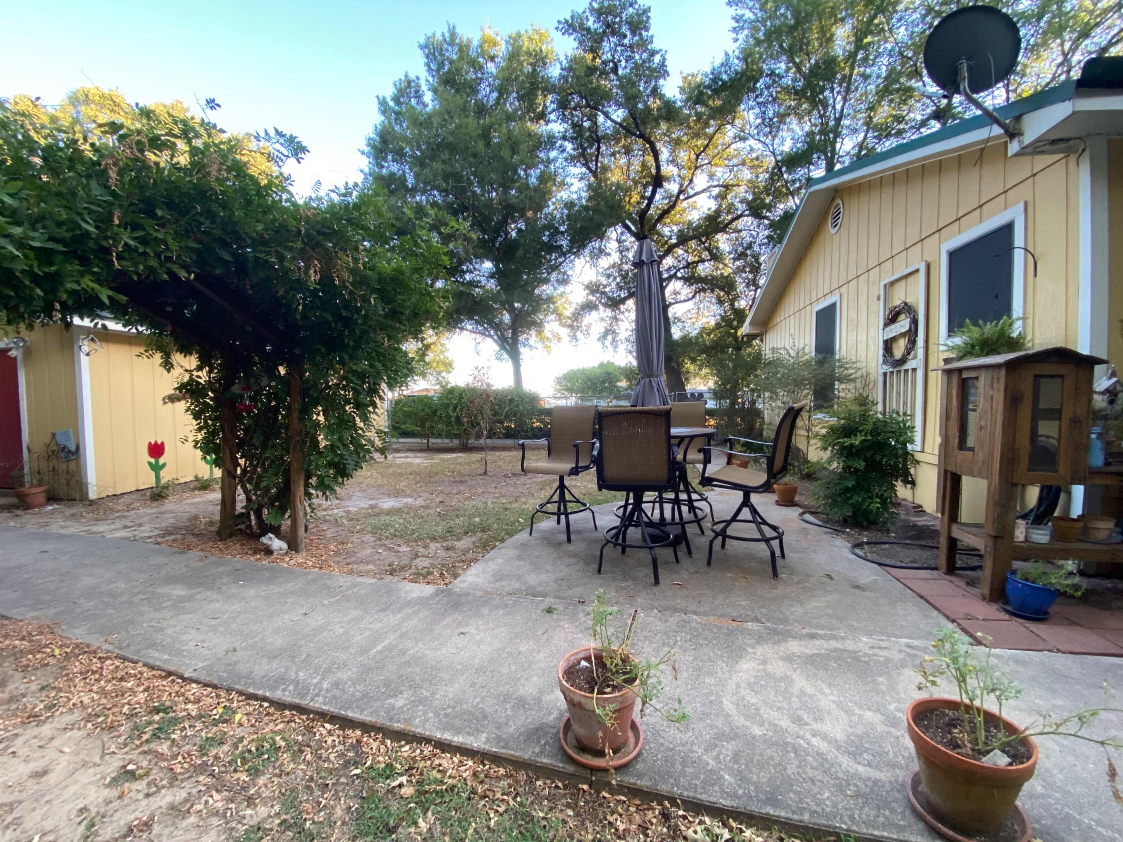 Lake area home with large gazebo and fenced backyard. Image in West Livingston, Livingston, TX