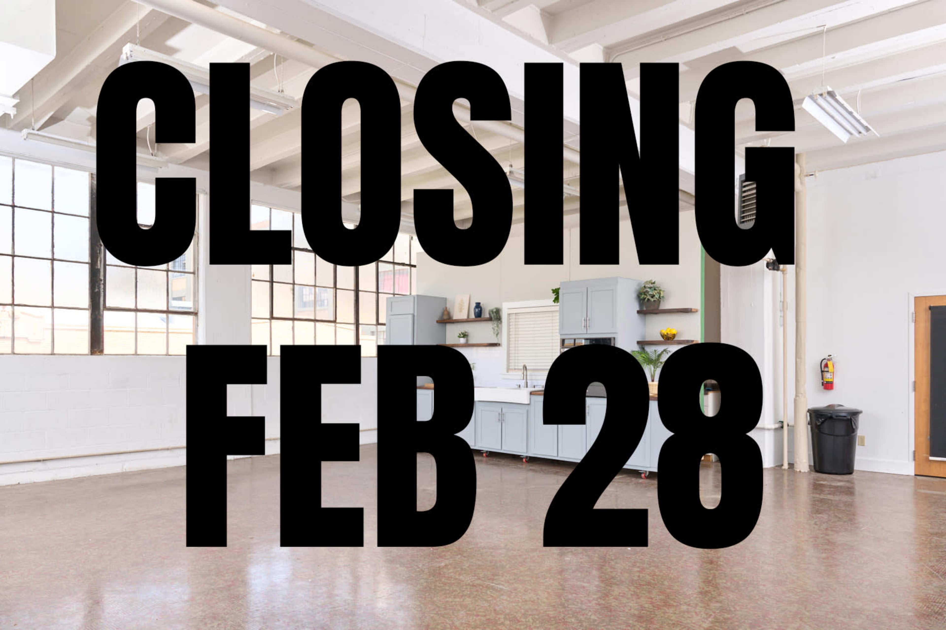 An empty room with large windows features a kitchen area in the background, and a notice indicating a closing date of February 28 is prominently displayed.