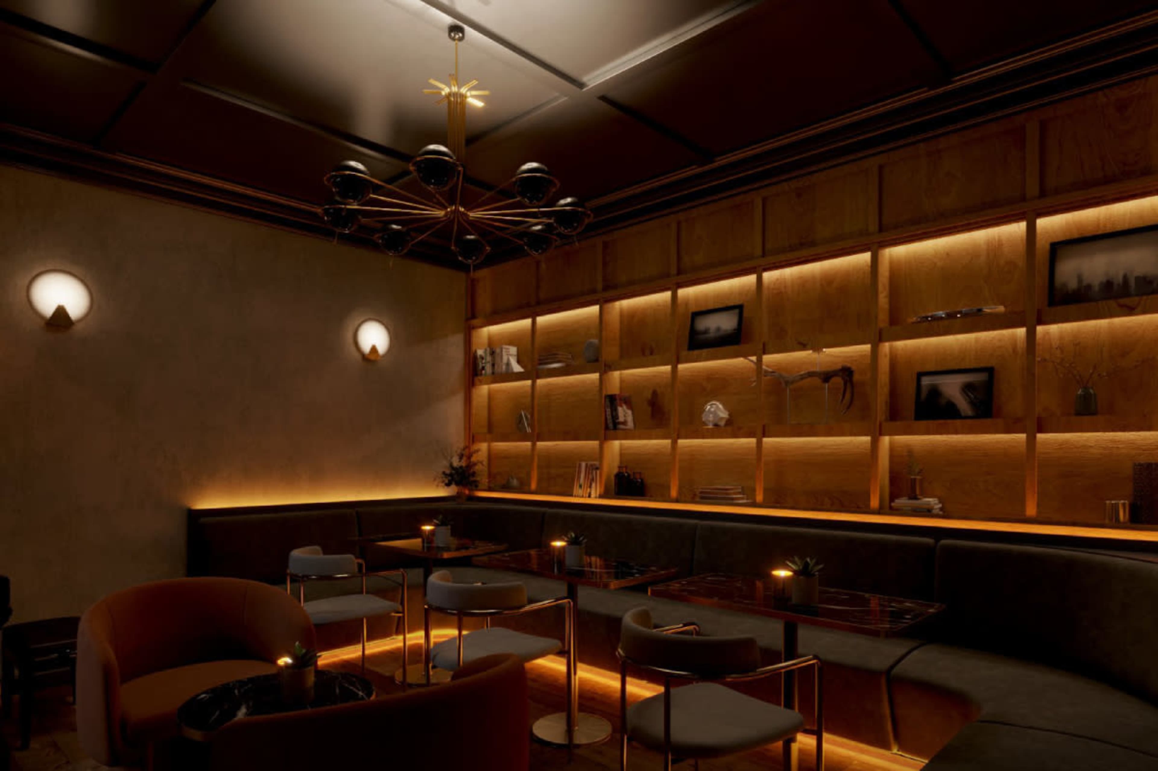 A dimly lit lounge features wooden shelves with decorative items and photographs, surrounded by cozy seating arrangements.