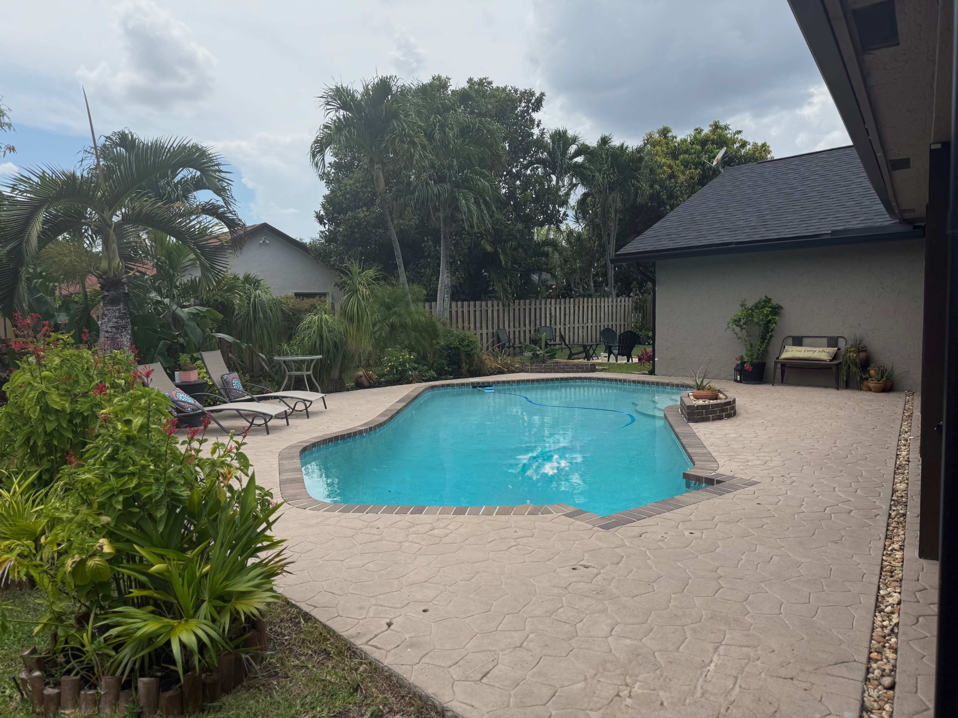 Private Poolside Oasis with Covered Patio, Fire Pit & Games Image in Plantation, Plantation, FL