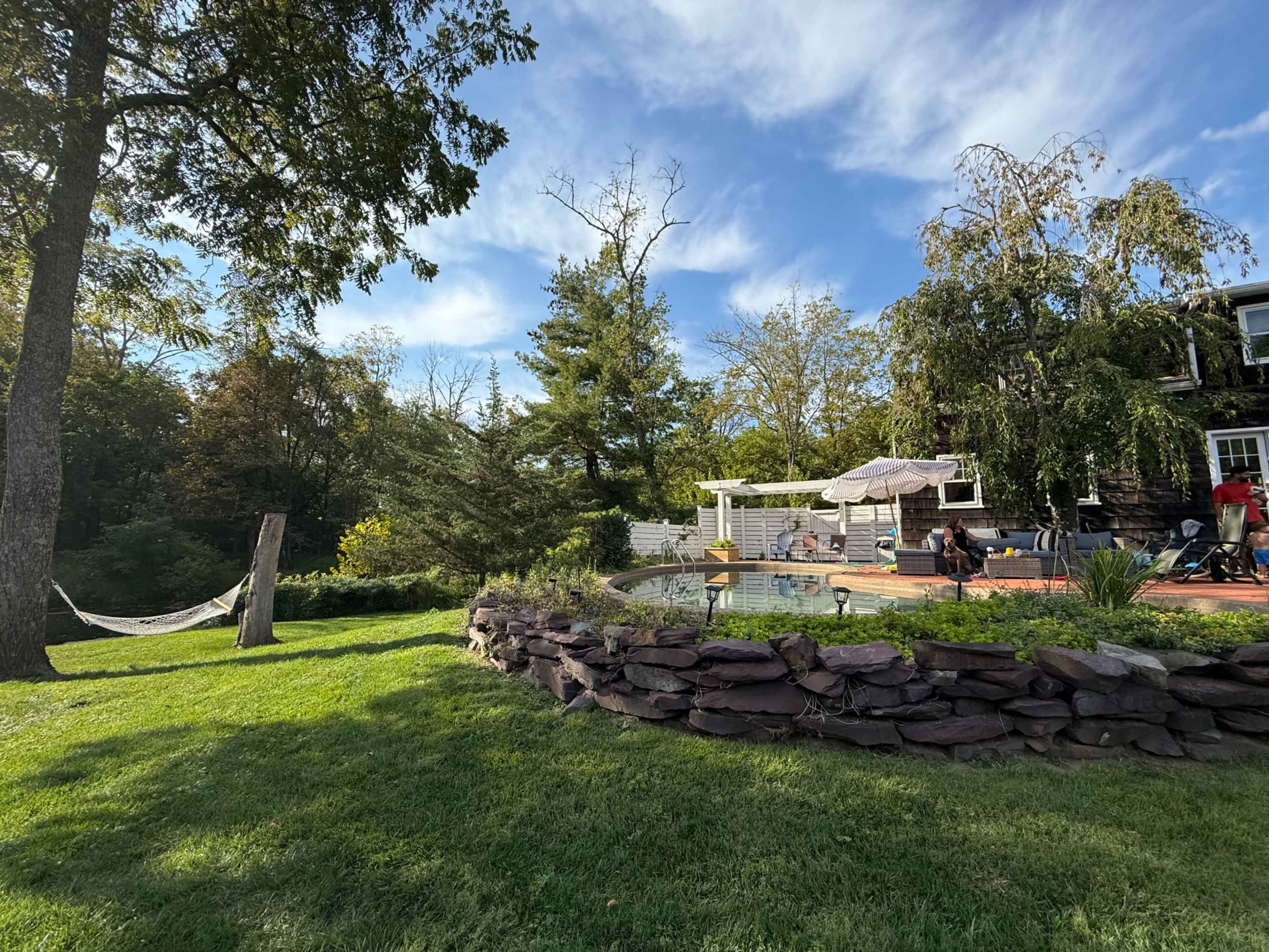 Dreamy Backyard with Pool and Water Views Image in Wycombe, Furlong, PA