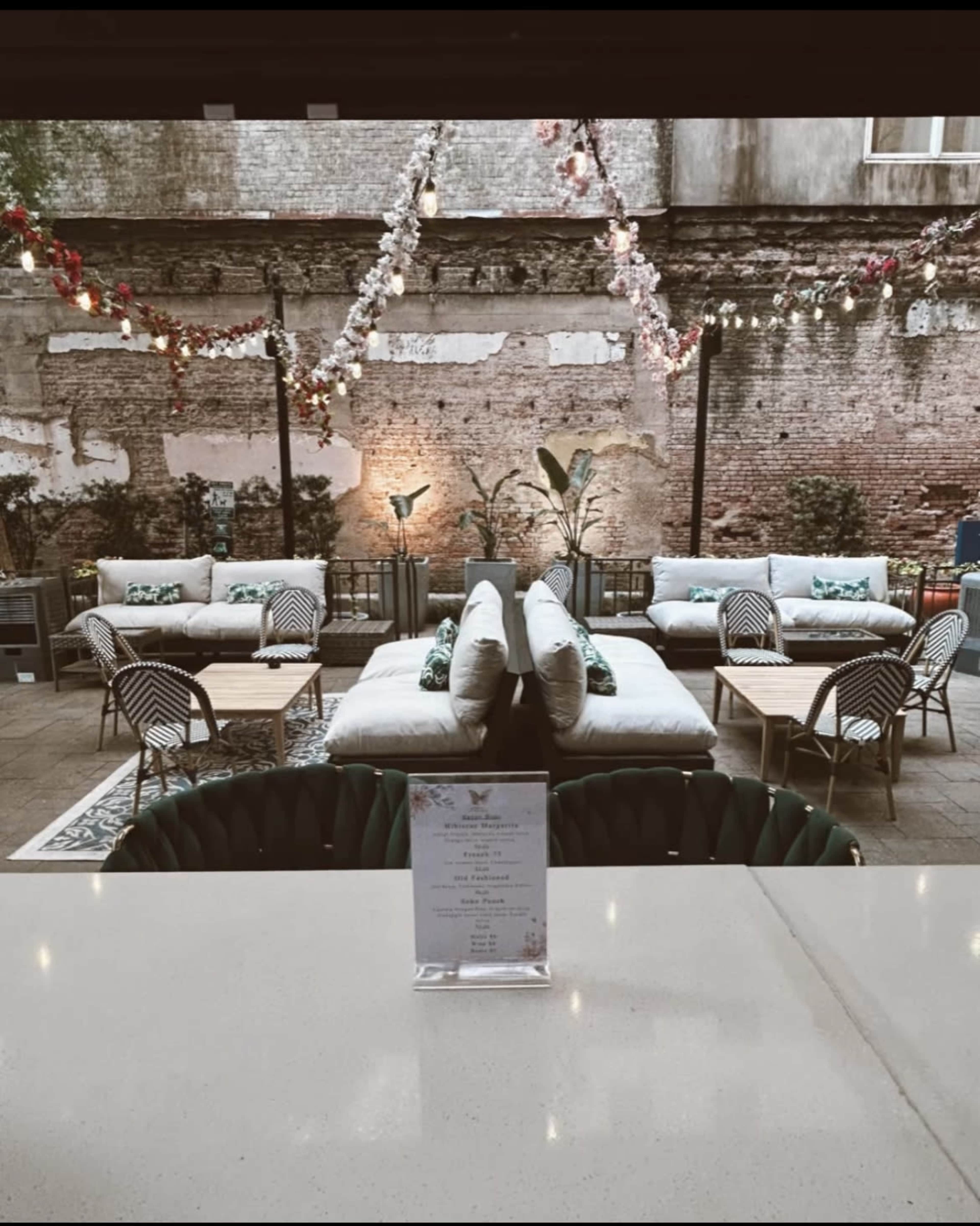 Downtown Houston open patio cocktail bar on Main st. Resembling what you would find in New York Image in Downtown Houston, Houston, TX