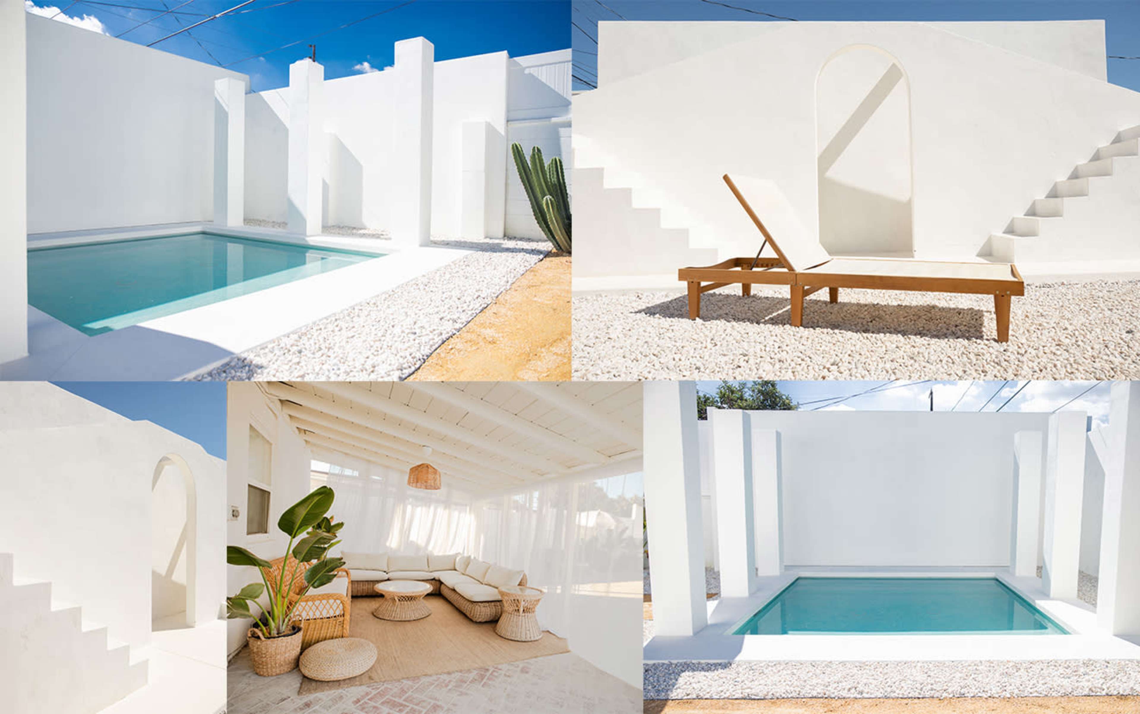 A minimalist outdoor space featuring a pool surrounded by white walls, a sun lounger, and a seating area with earthy decor.