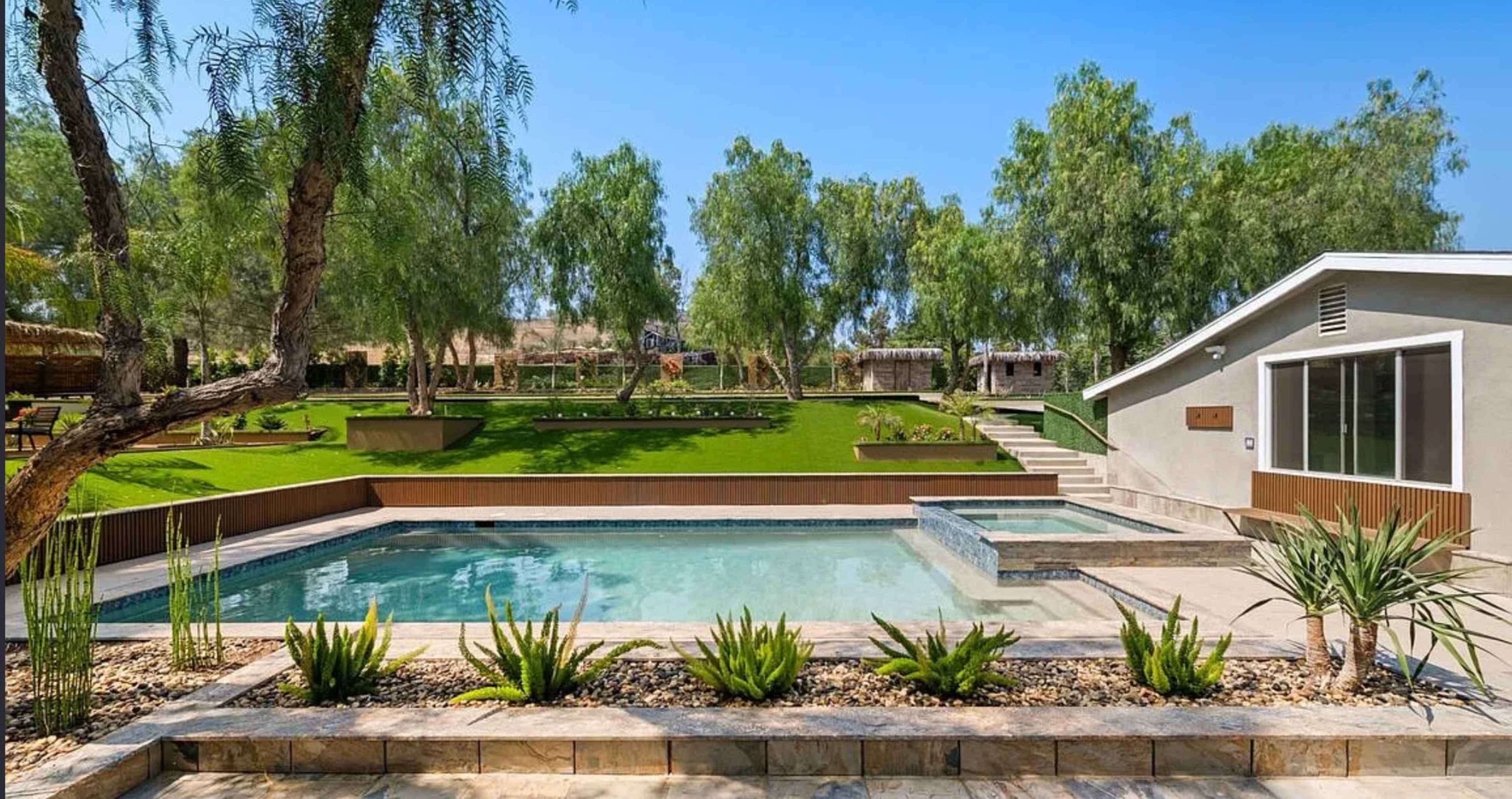 Resort style ranch with a pool, guest house, and main house, several pergolas, covered patio with the TV and surrounding sound system Image in Shadow Hills, shadow hills, CA