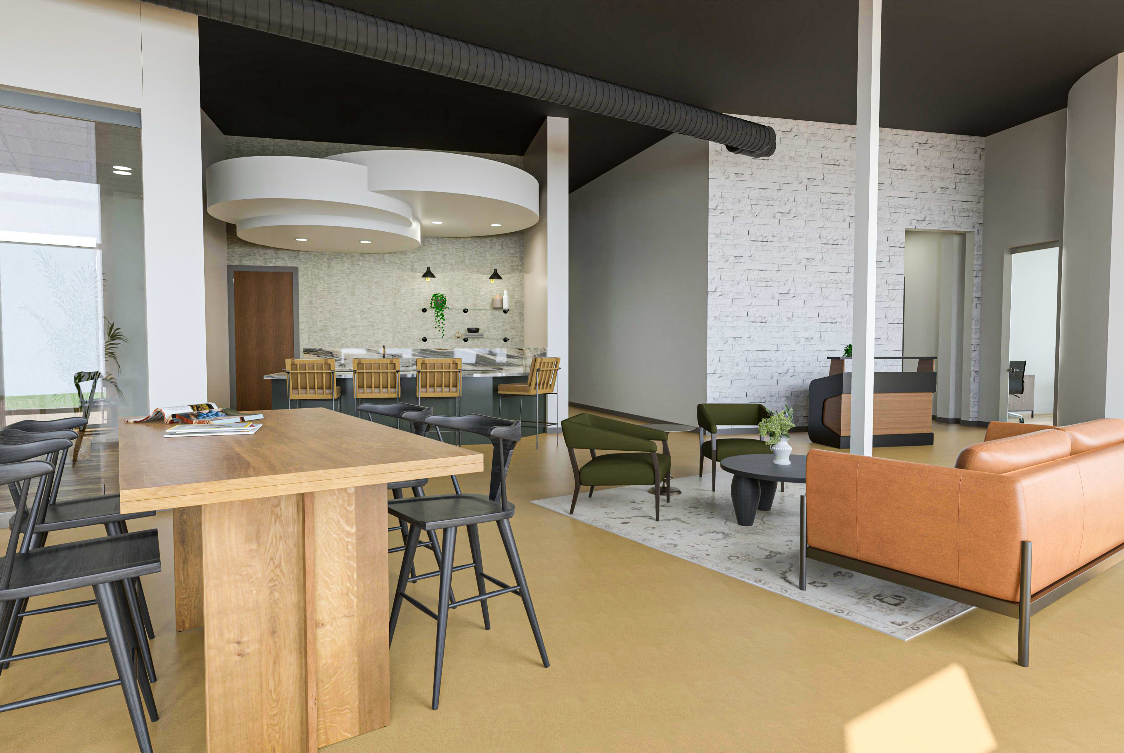 A modern interior space features a dining area with wooden tables and black chairs, a kitchen behind it, and a seating area with a brown leather sofa and green chairs on a light-colored floor.