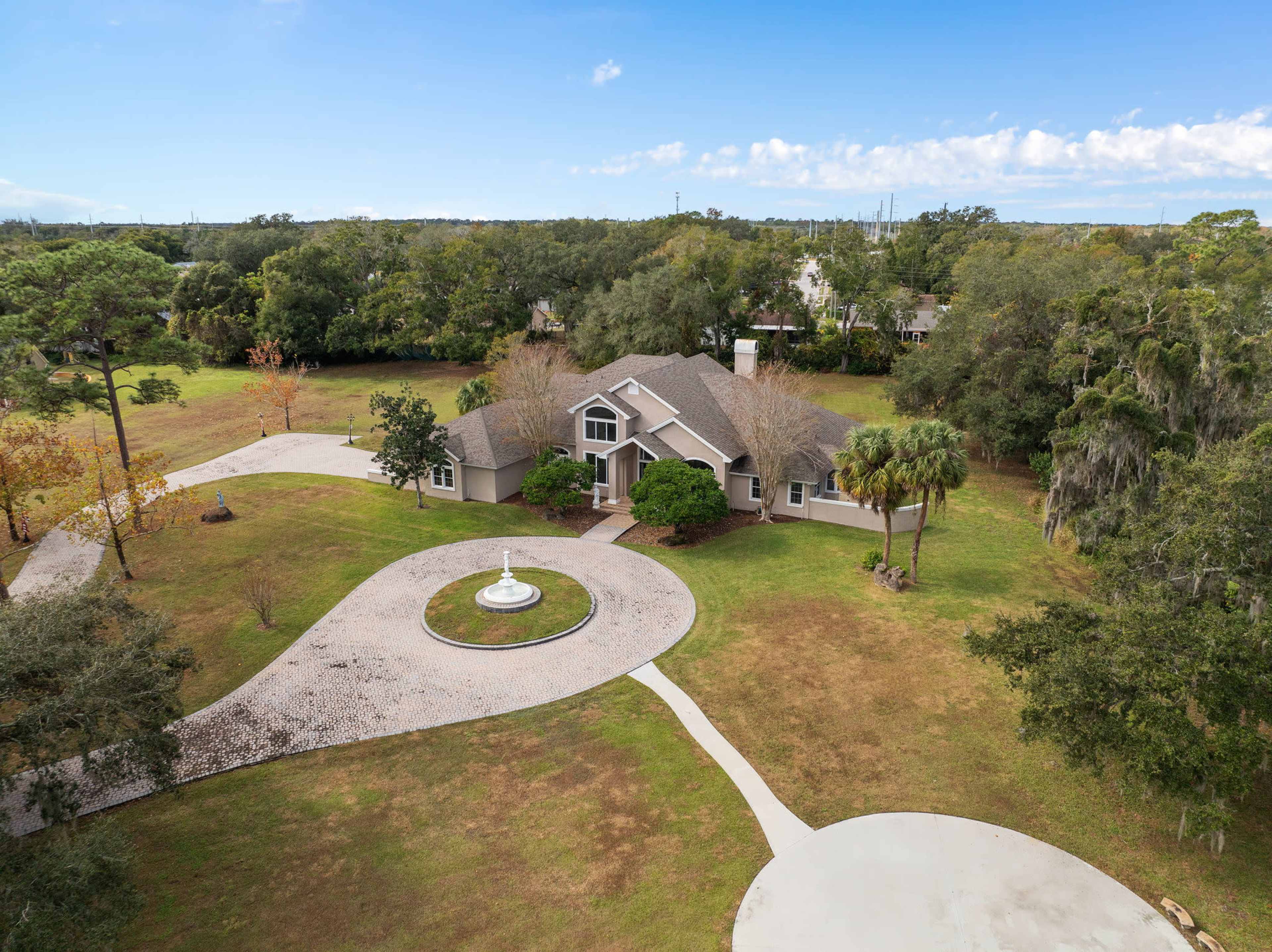 Modern Upscale Retreat: Photogenic Estate with Helipad, 3+ Acres on Little Wekiva River, Wildlife, and Gated Privacy Image in , Altamonte Springs, FL