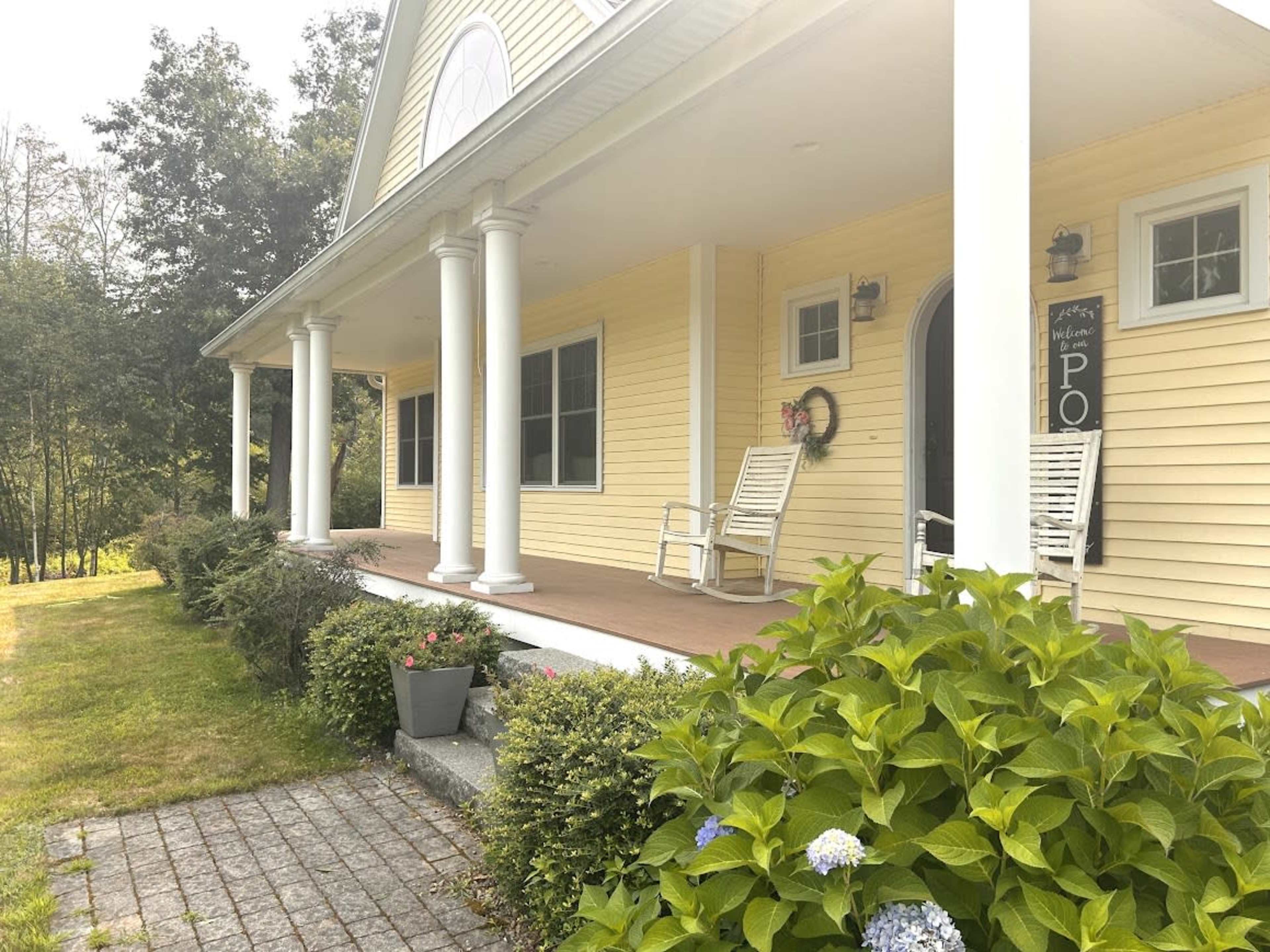 Large family home with front porch with 10 acres on a hill Image in Hampton Falls, Hampton Falls, NH