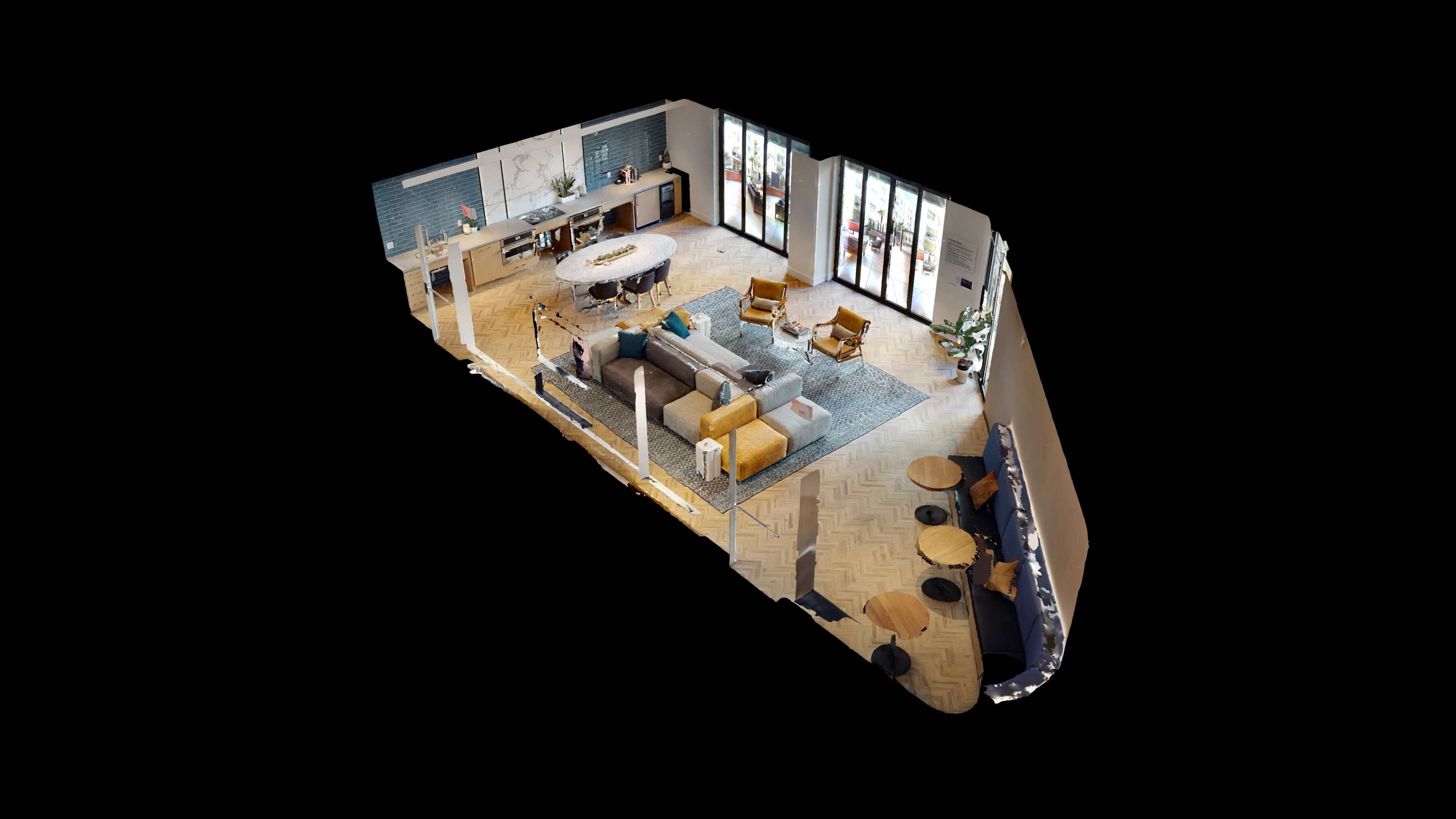 A modern living room and dining area layout featuring a large round table, a sectional sofa, and several chairs placed around a coffee table.