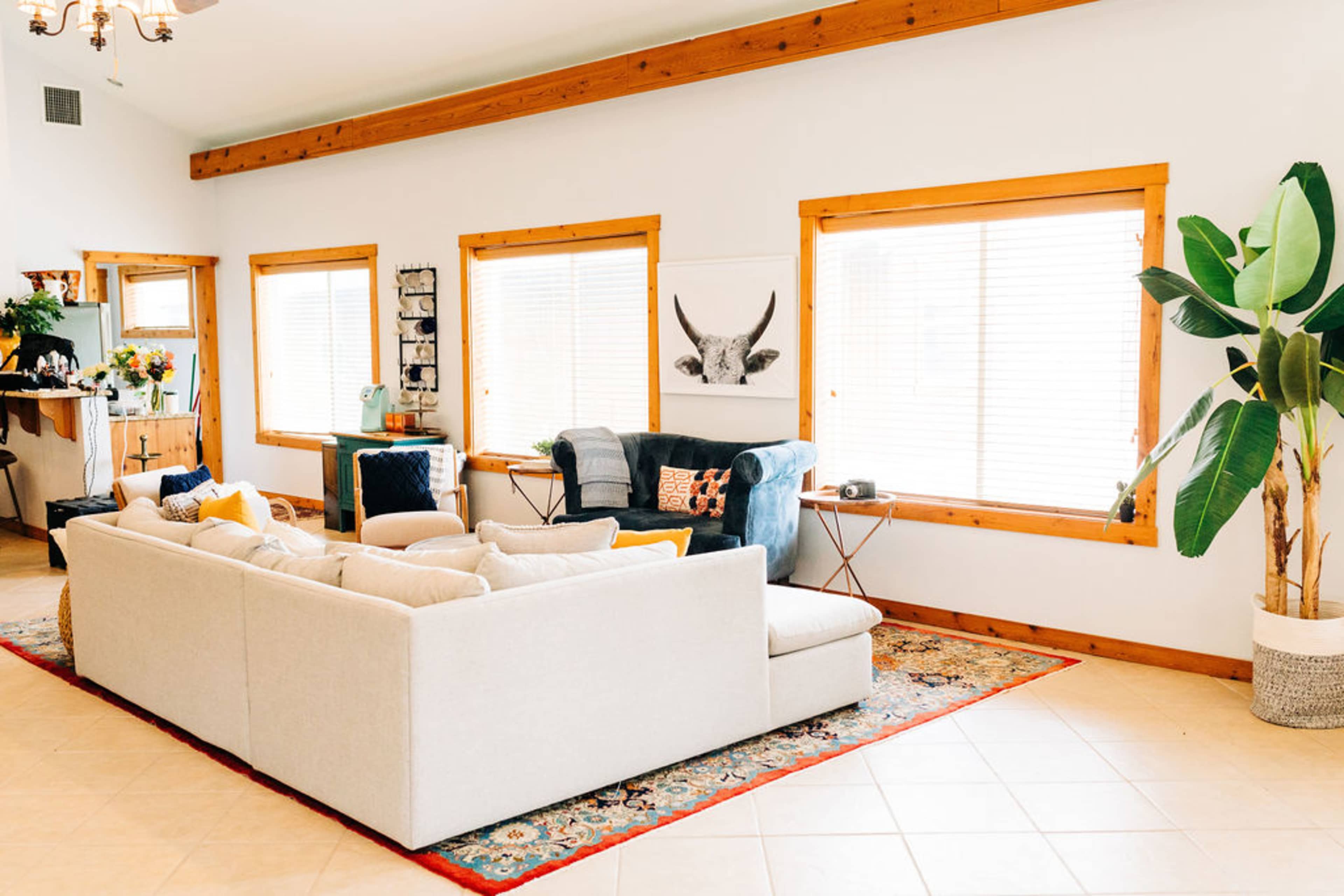 Large lounge and living area with Persian rugs and stylish decor Image in , Bastrop, TX