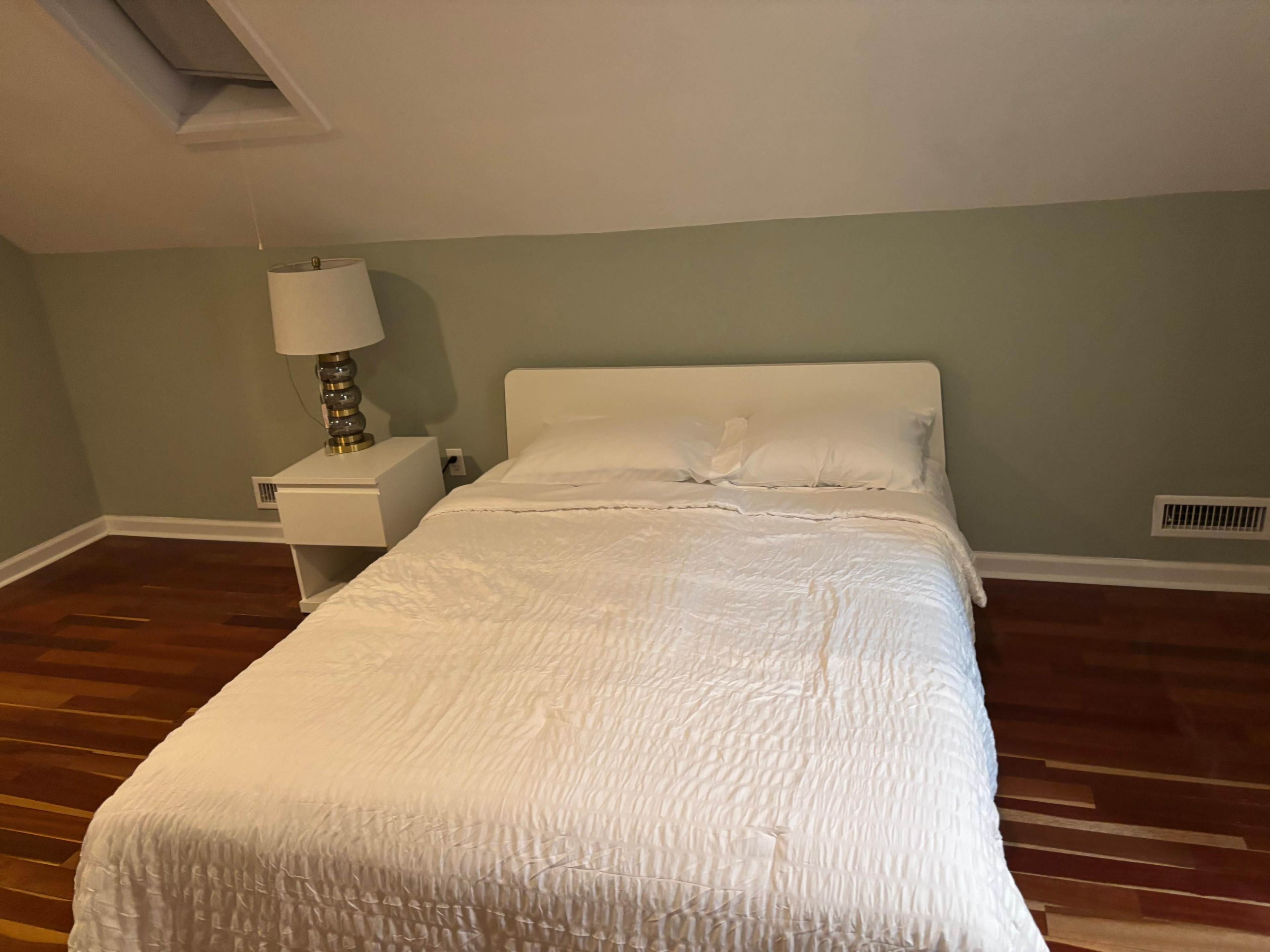 Urban and Artsy Open Floor Living Room and Kitchen Space with Great Natural light Image in Riverdale Park, Riverdale, MD