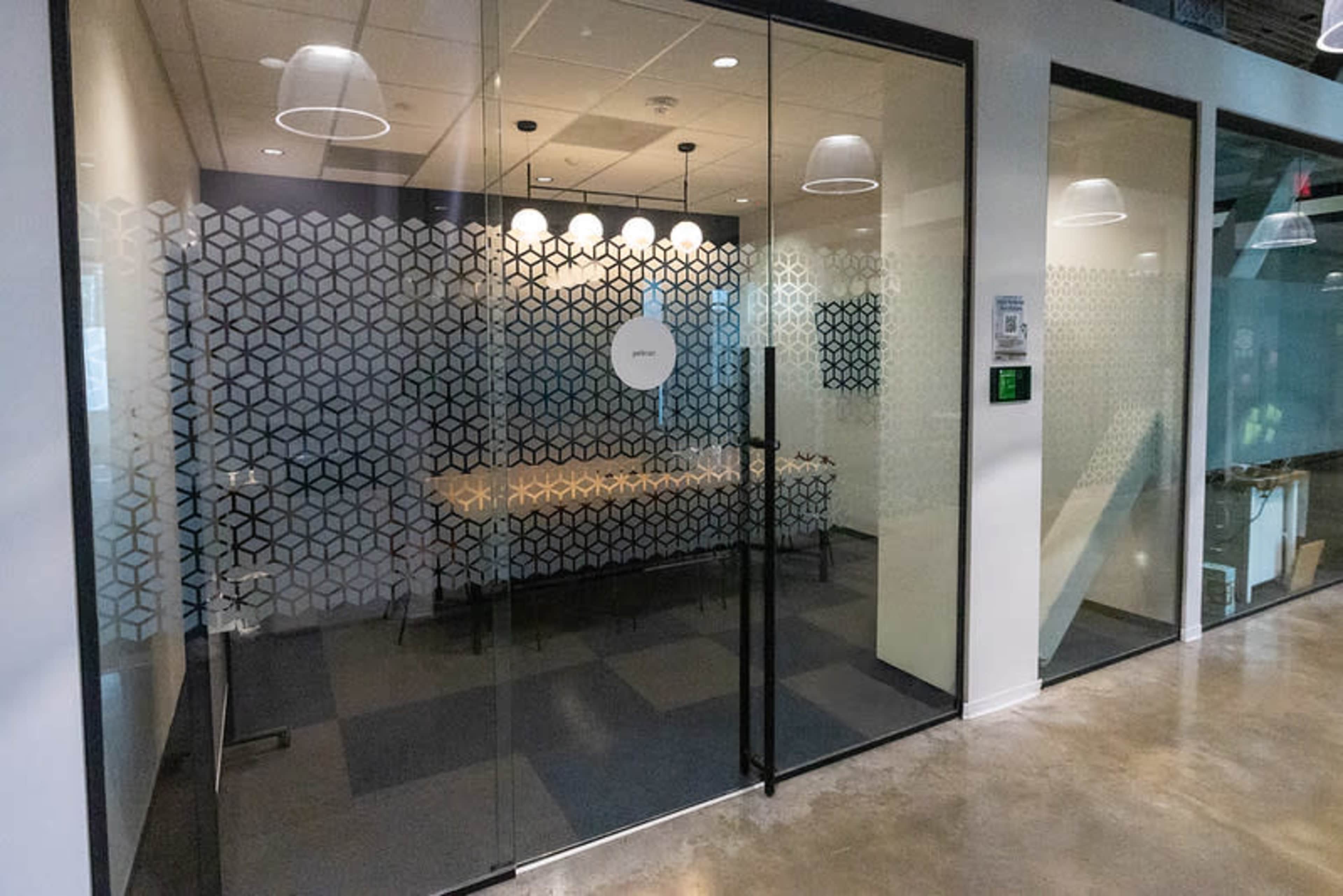 Modern 8-Person Meeting Room in Newport News | Pelican Image in Tech Center, Newport News, VA