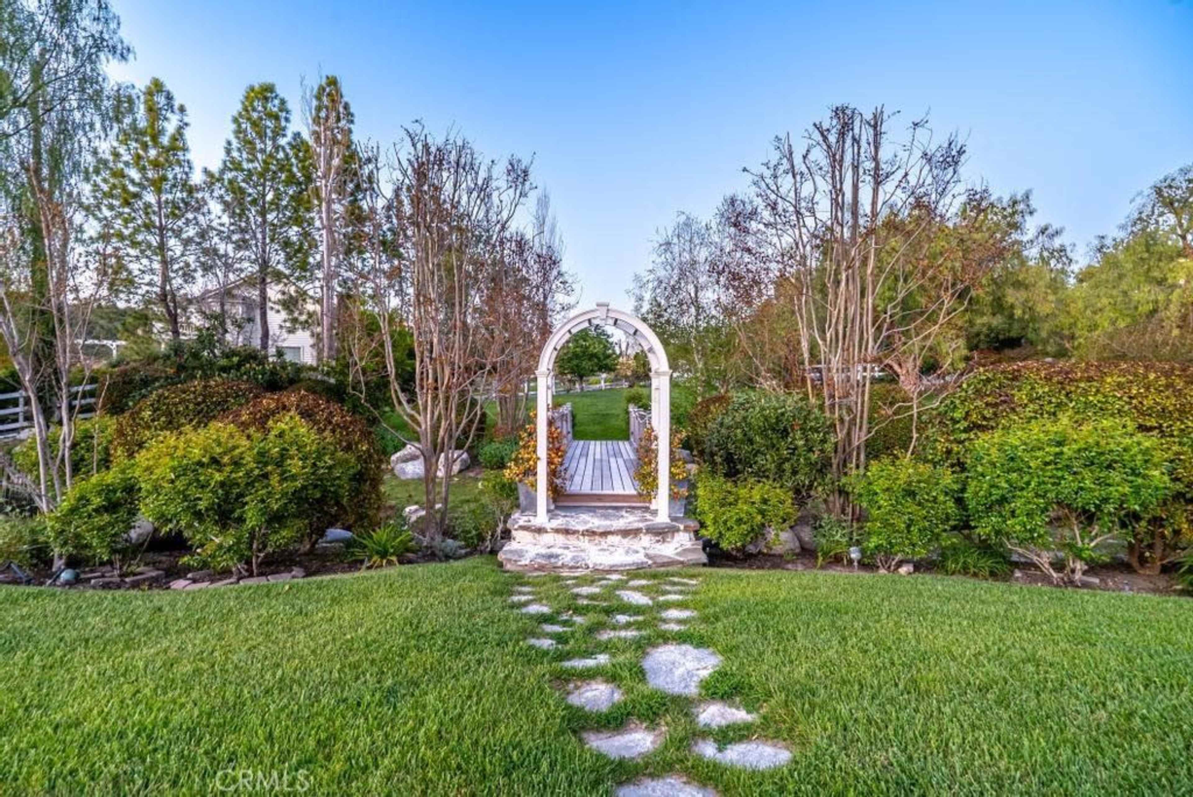 Expansive Outdoor Space with Pool, Lawn, Bridge and Amazing Scenery. Image in Canyon Country, Santa Clarita, CA