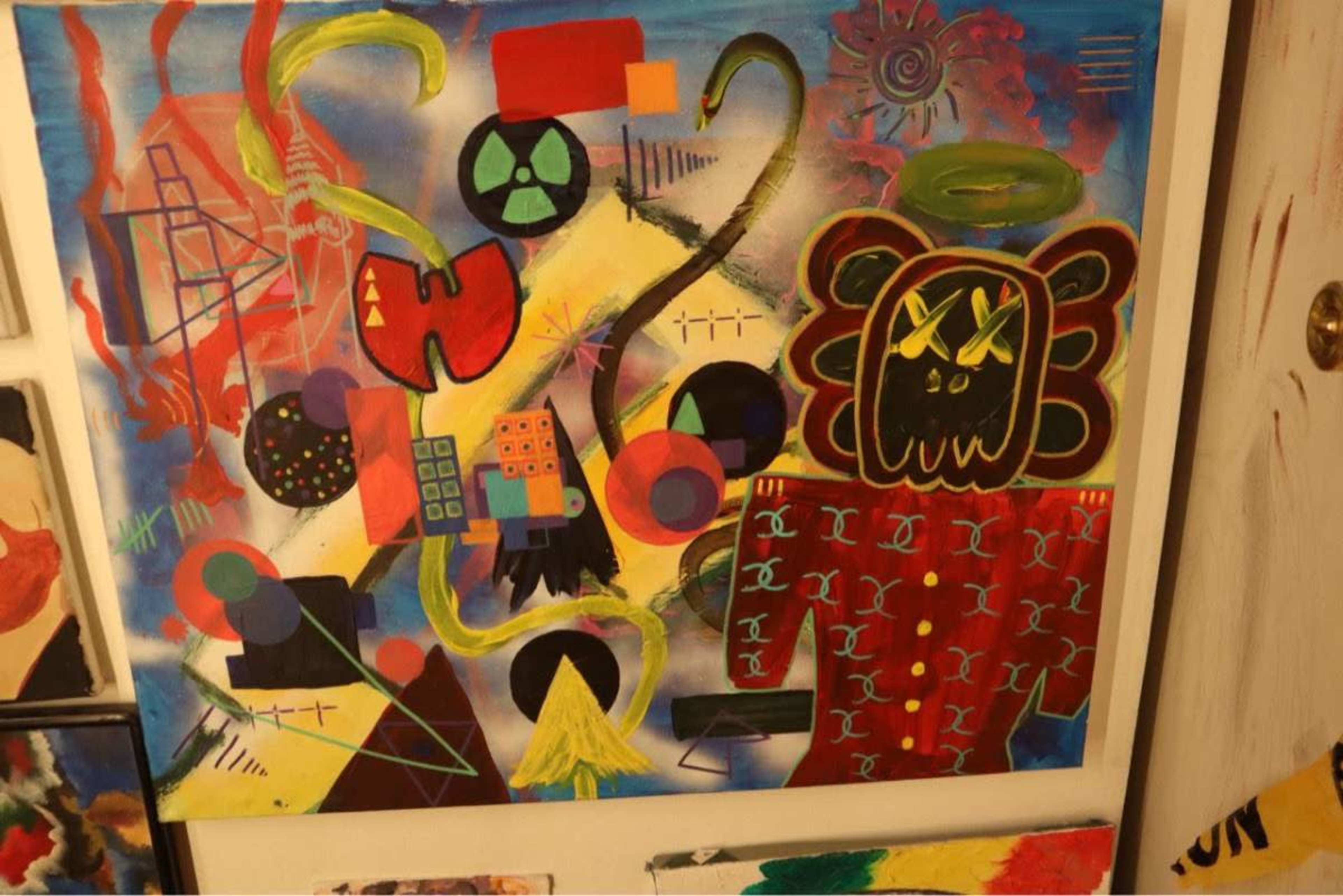 The image depicts a vibrant abstract painting featuring various geometric shapes, bold colors, and a stylized figure with exaggerated facial features.