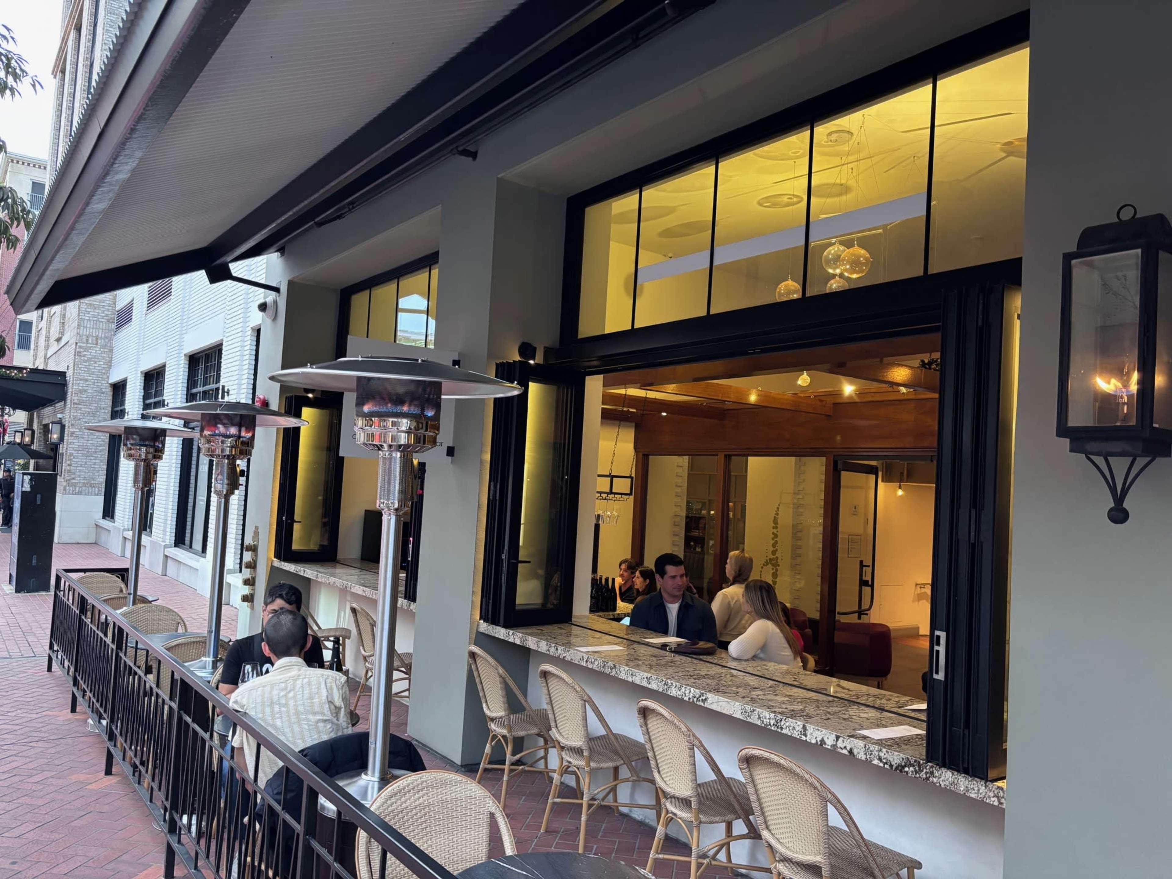 Chic space featuring an elegant wine bar with outdoor patio seating Image in Asian Pacific Thematic Historic District, San Diego, CA