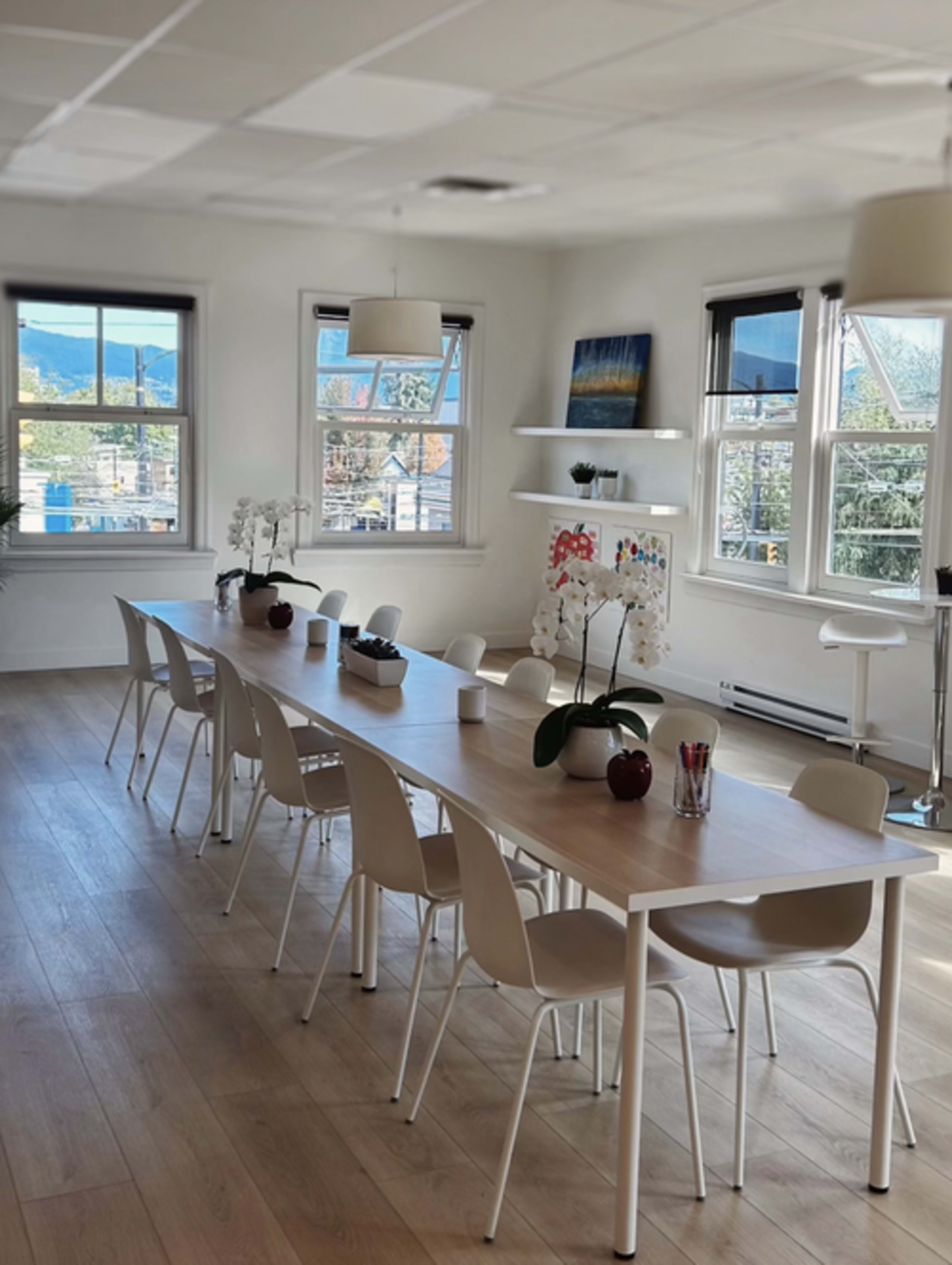 A bright, airy studio with mountain views — a serene space to move, breathe, and connect. Image in West Side, Vancouver, BC