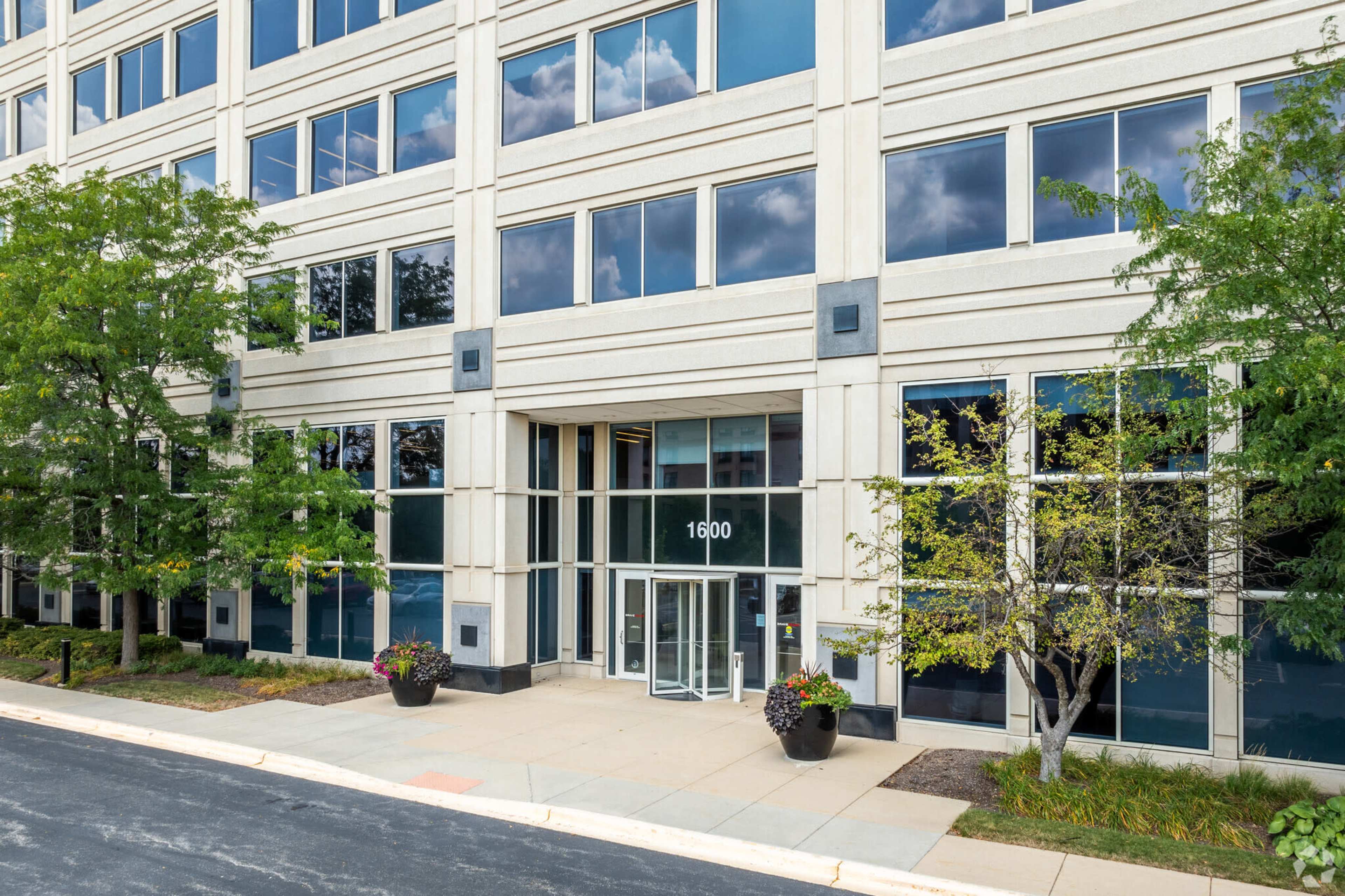 Modern 12-Person Meeting Room in Top Floor Coworking Space Image in Schaumburg Township, Schaumburg, IL