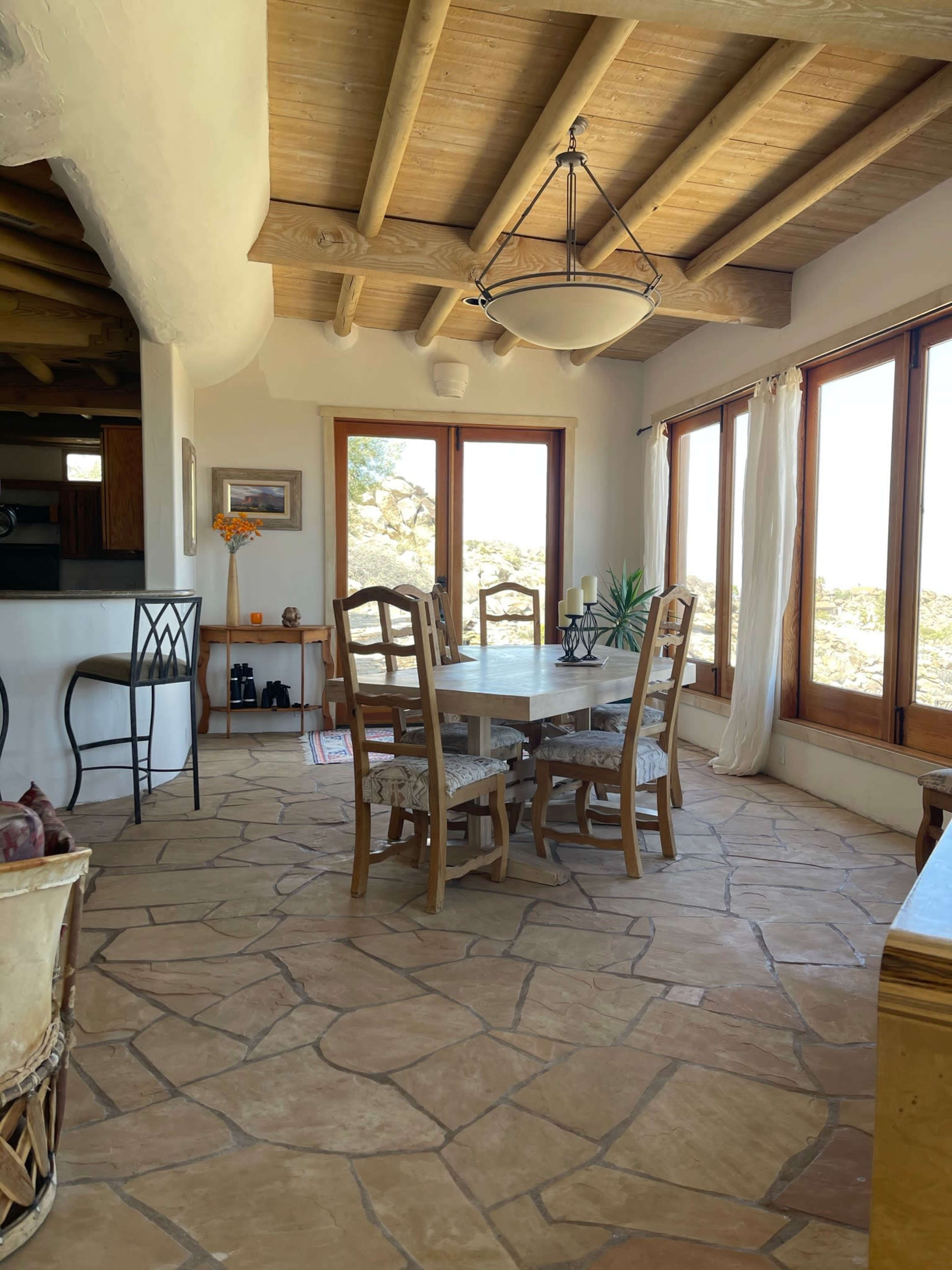 50-mile vista,  desert mountain home,  rustic interior, heavy timber ceilings, stone floors, with pool, hot tub - 45 mins from Palm Springs or Coachella site Image in , Mountain Center, CA