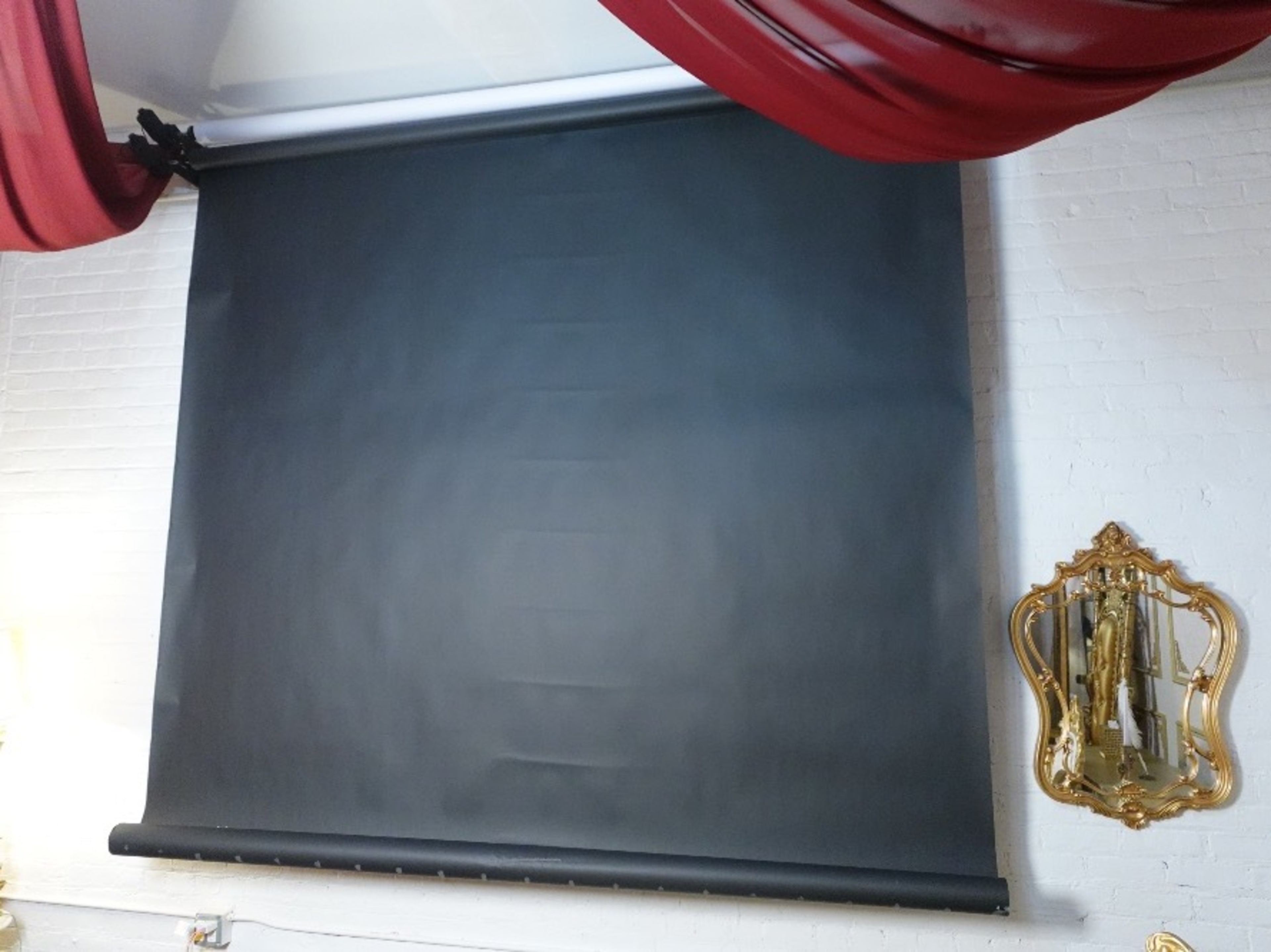 Remote-Controlled Black Seamless Paper Backdrop