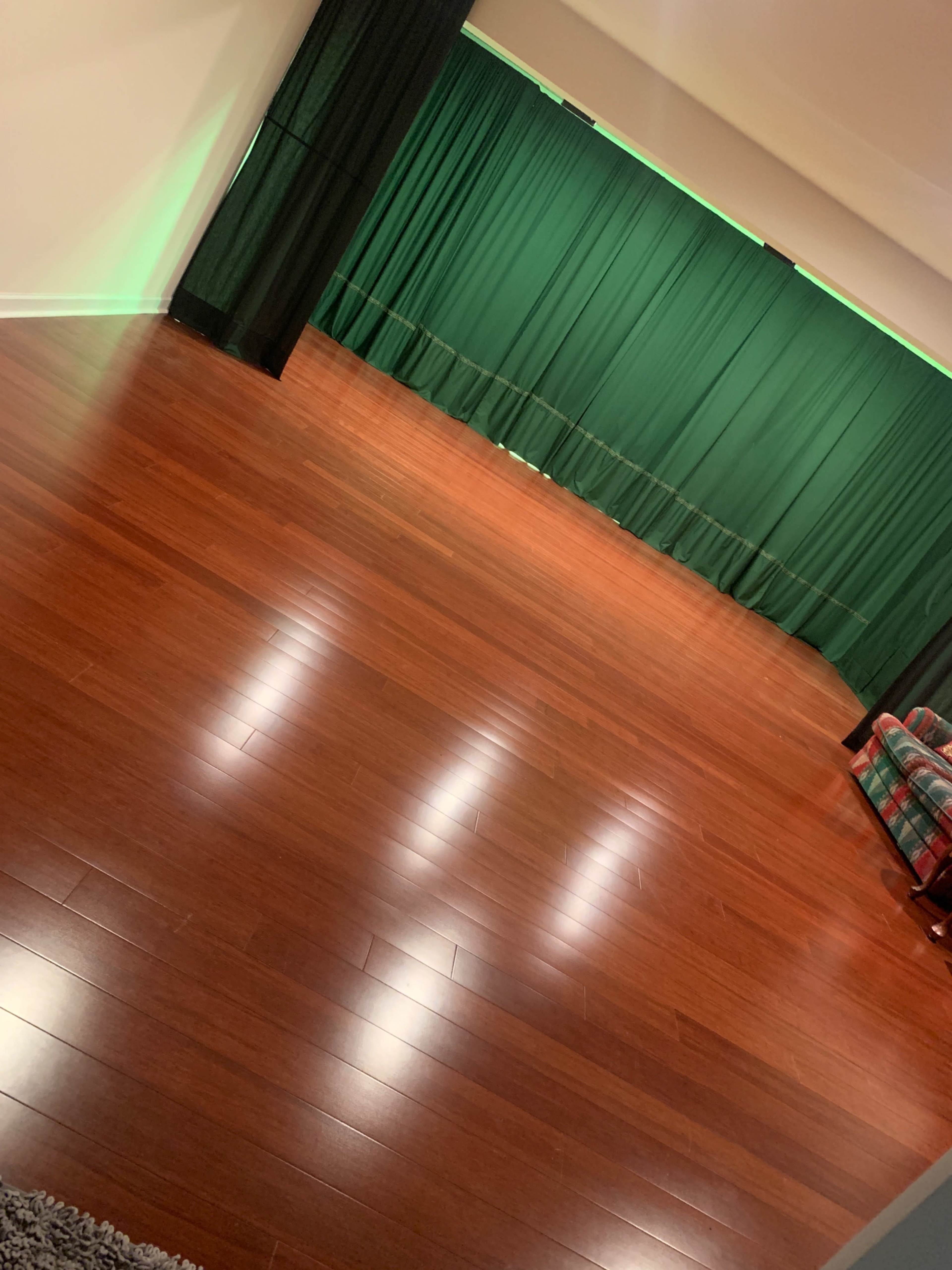 Entertainment room with continuous floor space and backdrop curtain Image in Maple Lawn, Fulton, MD