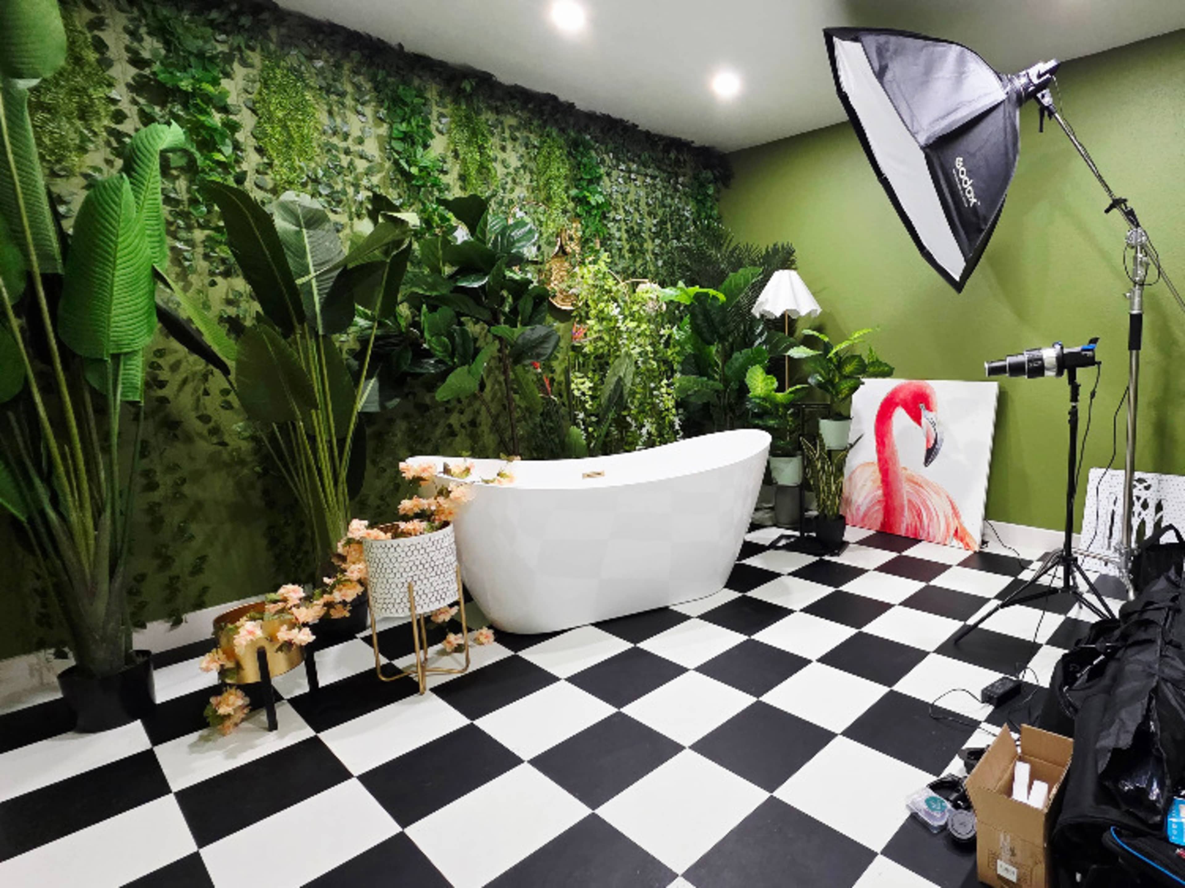 Jungle themed room with freestanding tub
