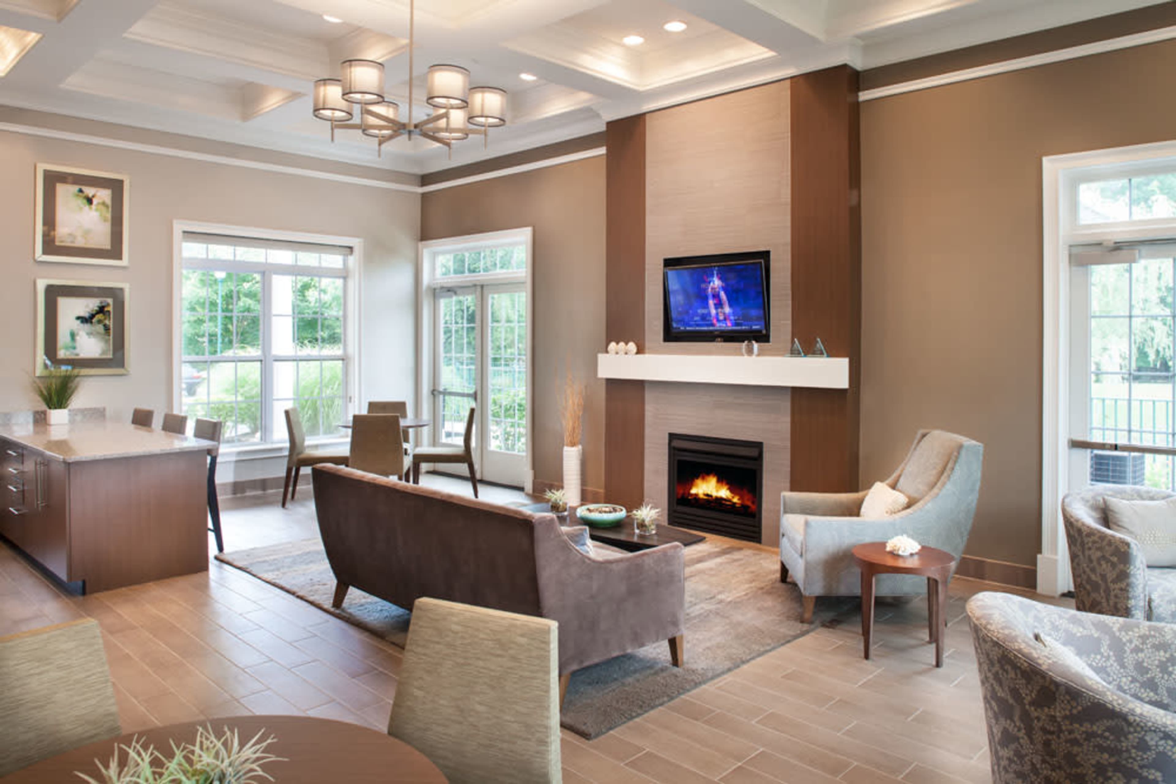 Spacious Clubroom with Fireplace & Plush Seating Image in Florham Park, Florham Park, NJ