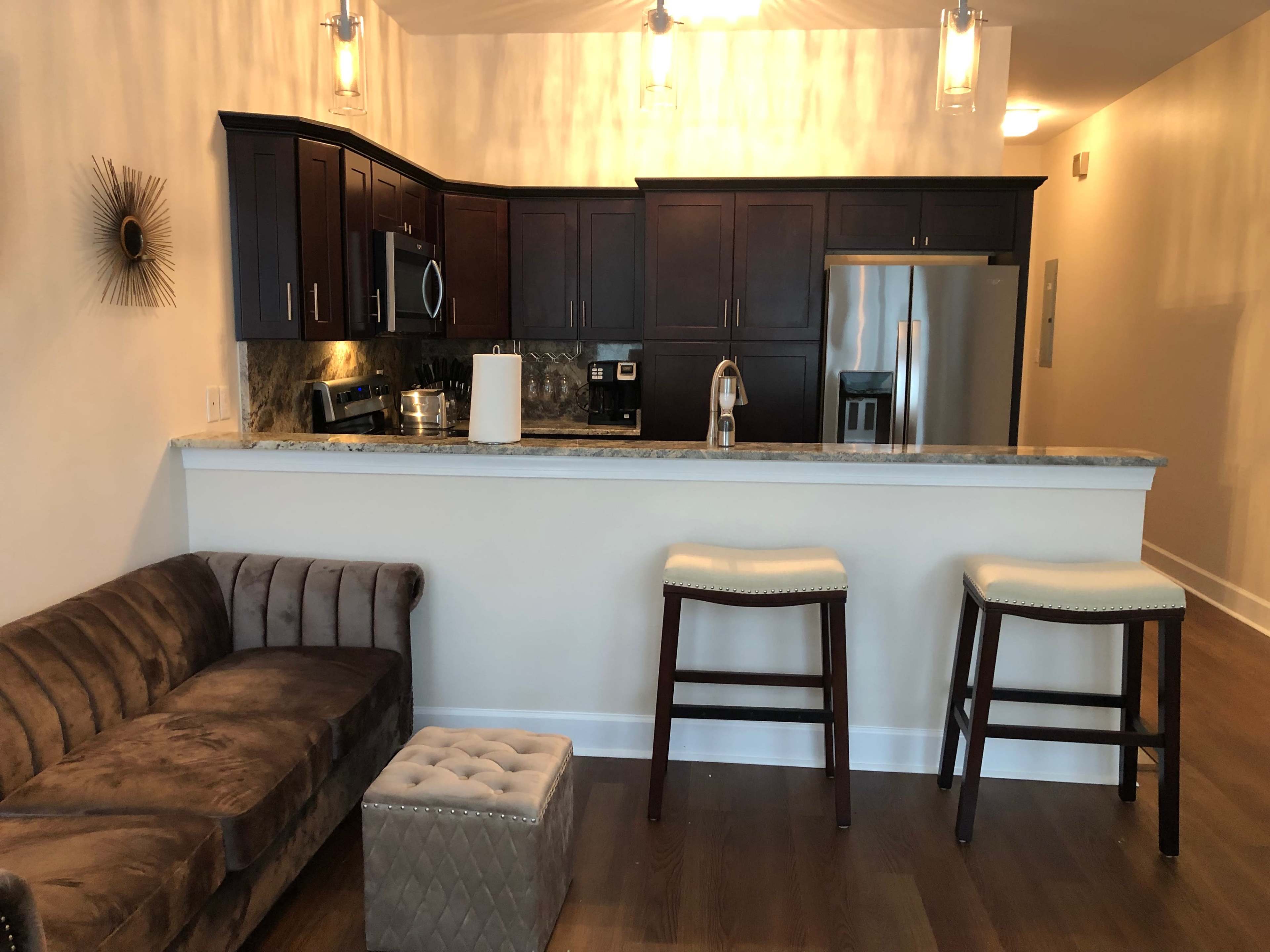 Newly Constructed 3 Story Modern Contemporary Townhome with Swanky Rooftop Patio Decorated with Silk Flowers. Image in Tallahassee, tallahassee, FL